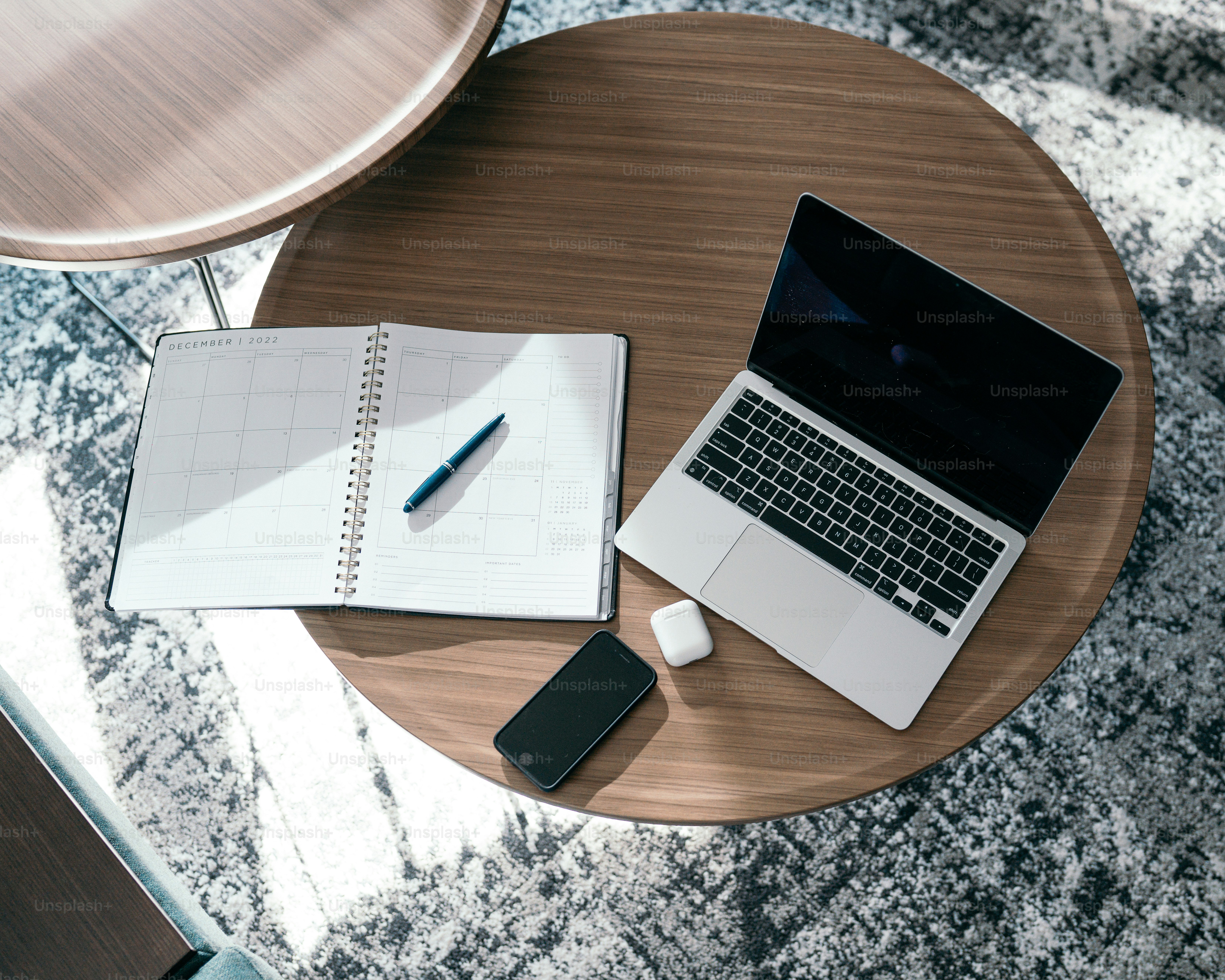 a tablet and a pen on a table