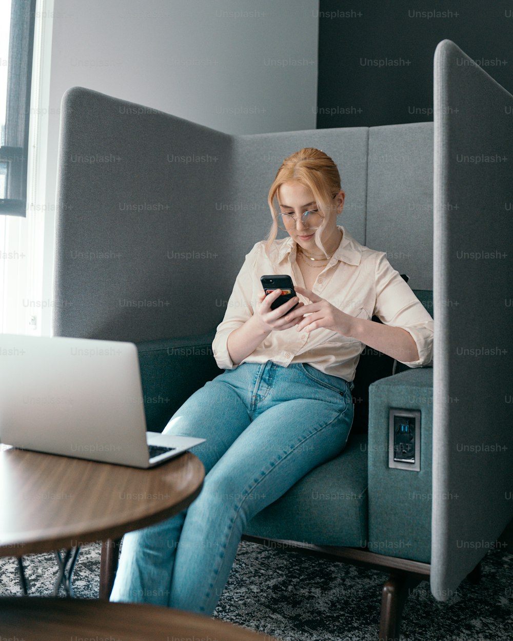 a woman sitting on a chair