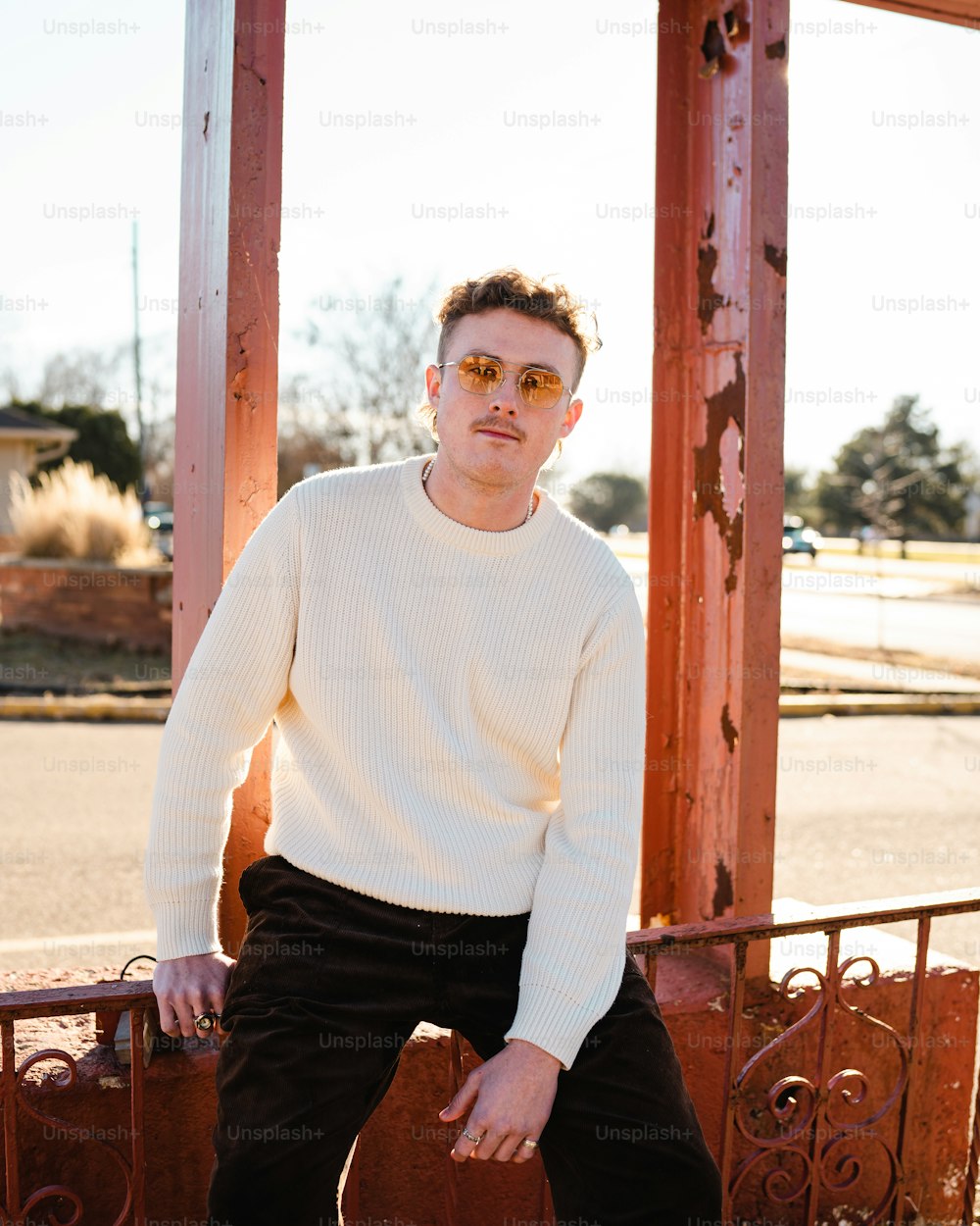 a man sitting on a bench