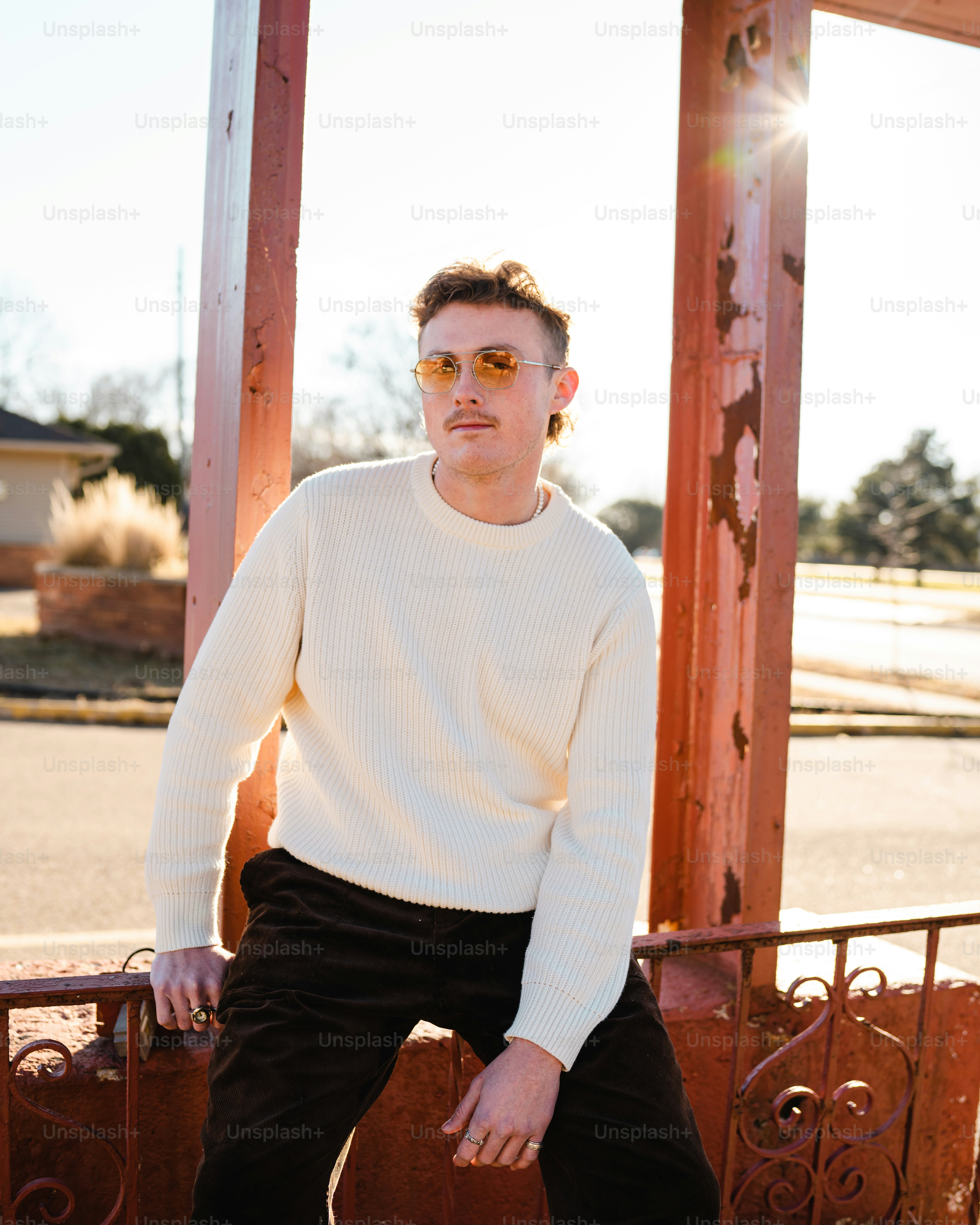 a man sitting on a bench