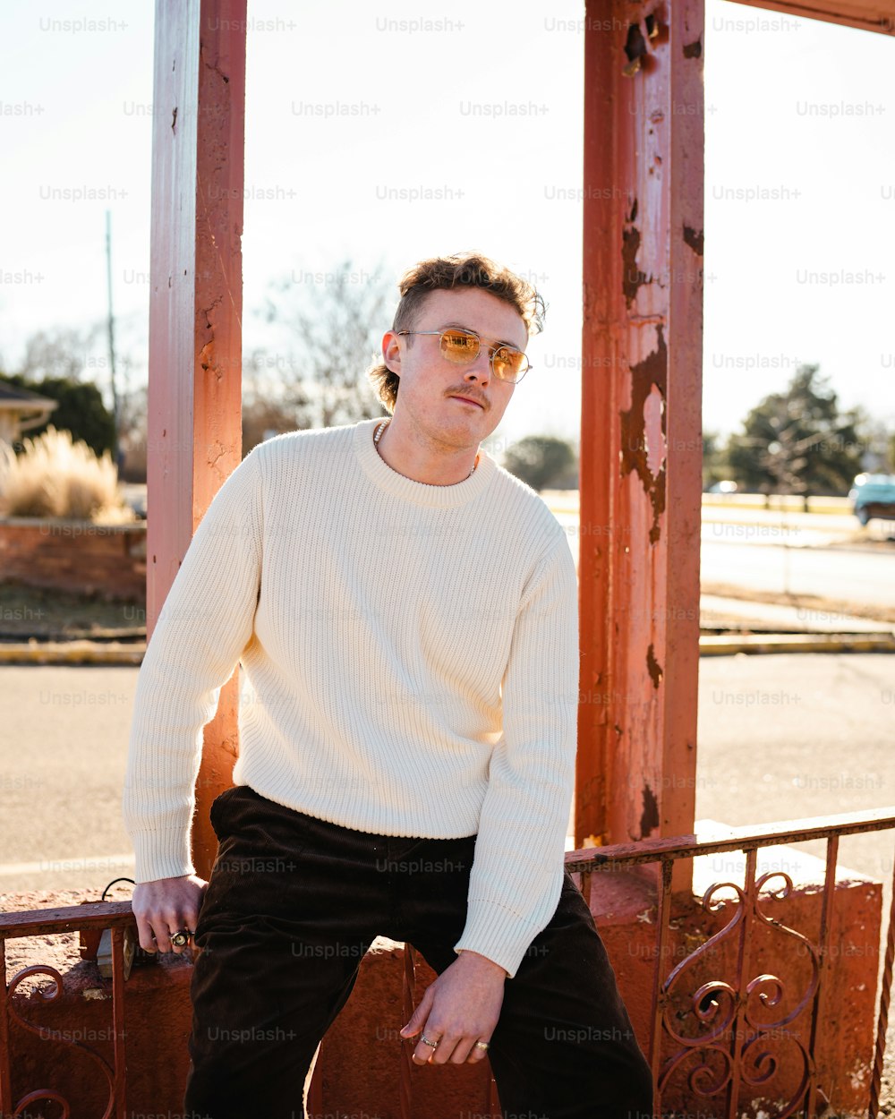 a man sitting on a bench