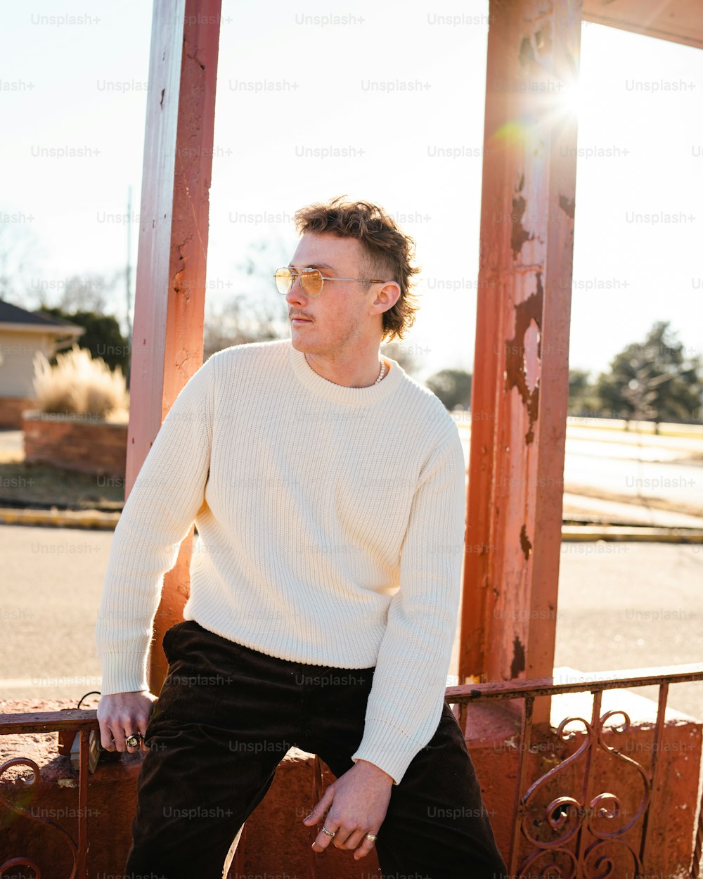 a man sitting on a bench