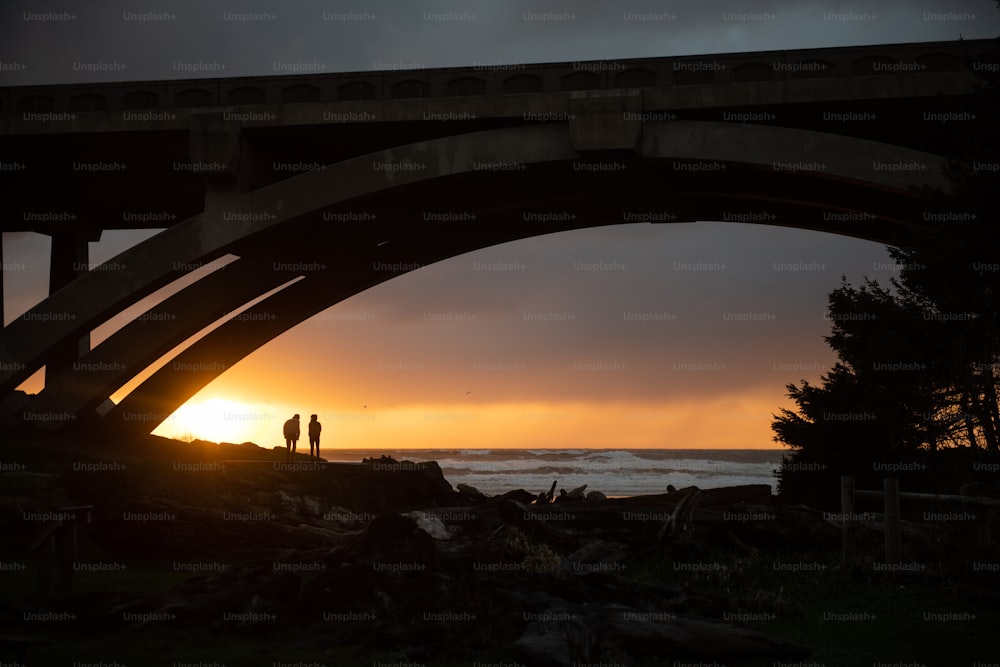 a bridge with people standing on it