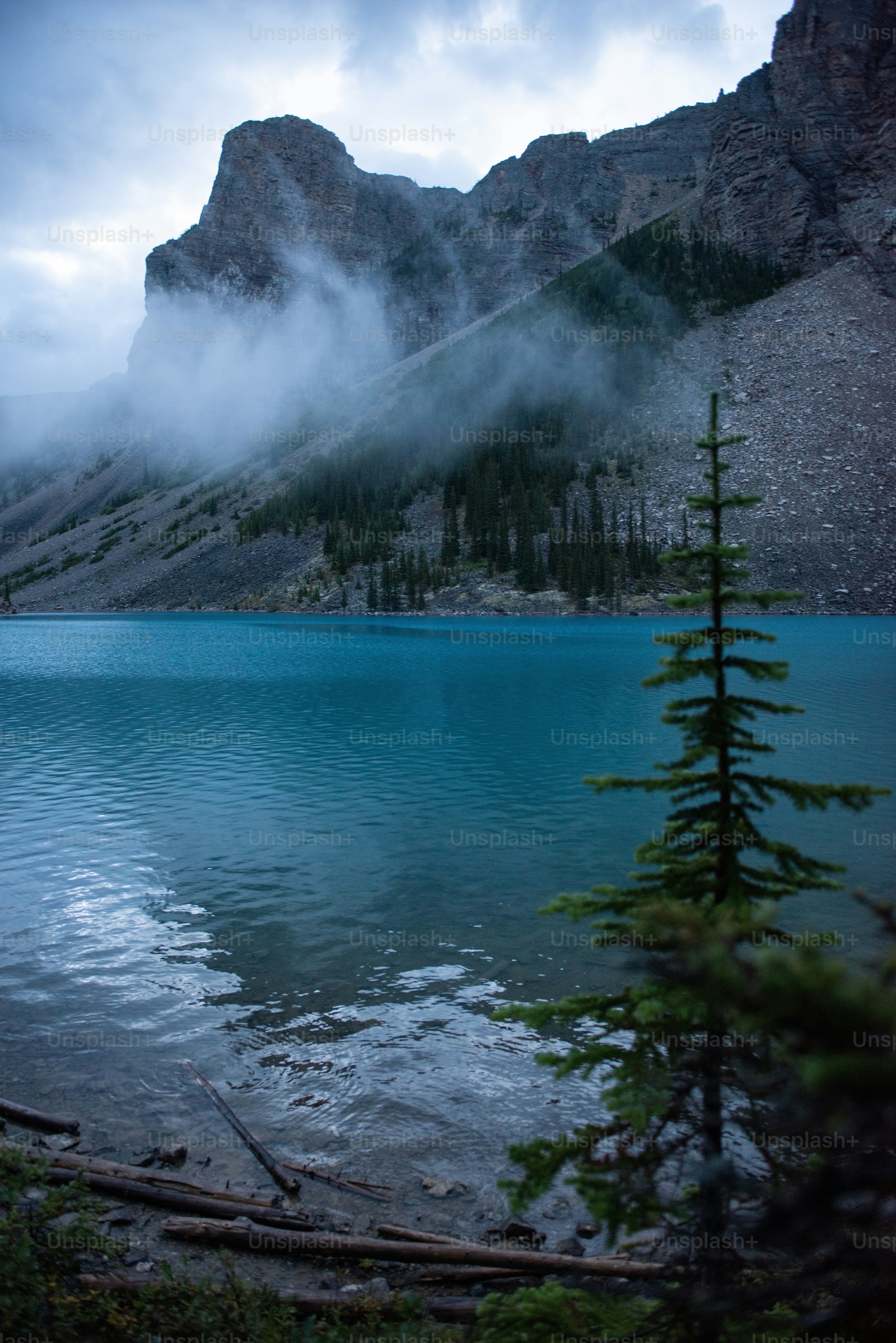 a lake with a mountain in the background