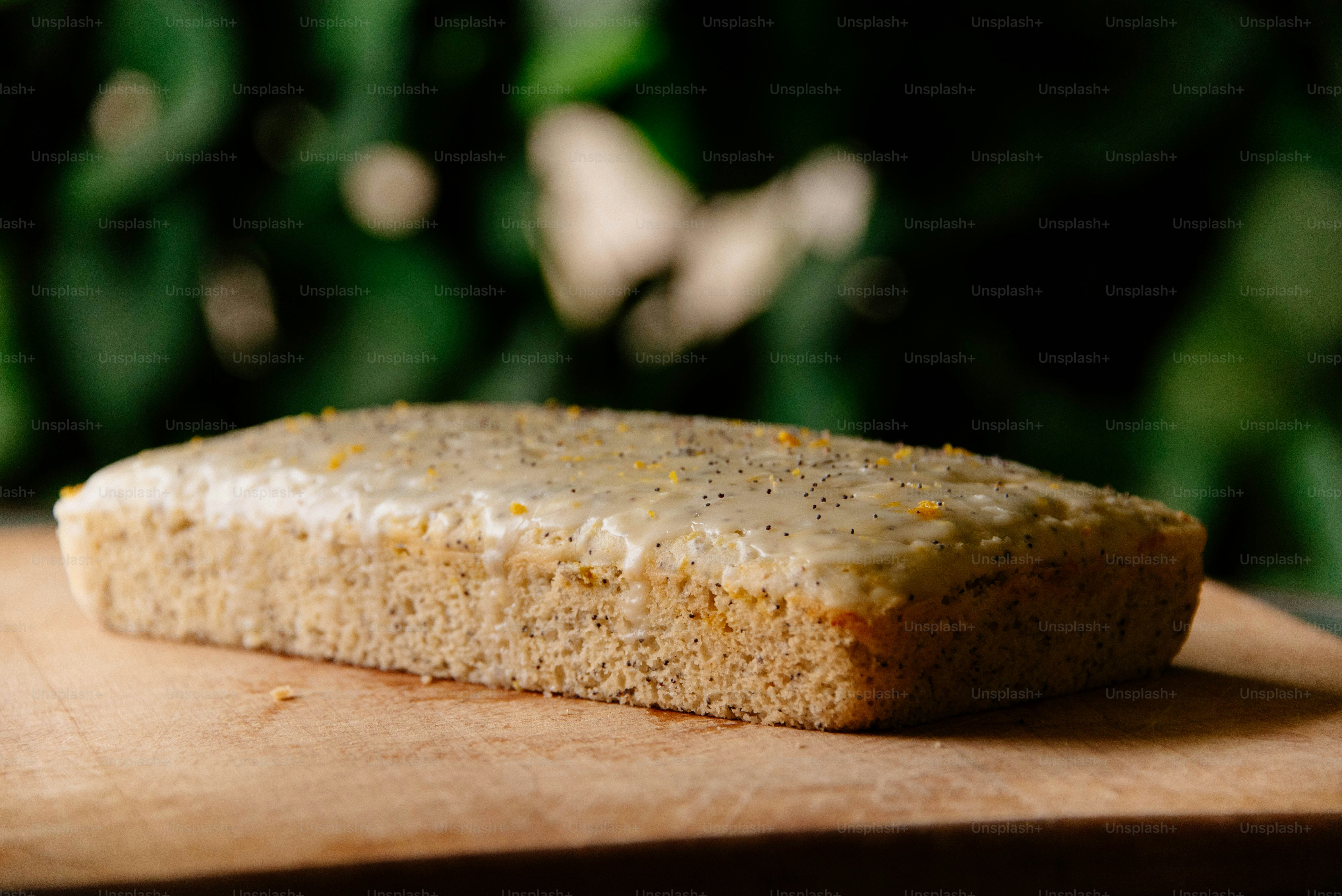 a loaf of bread on a wooden surface
