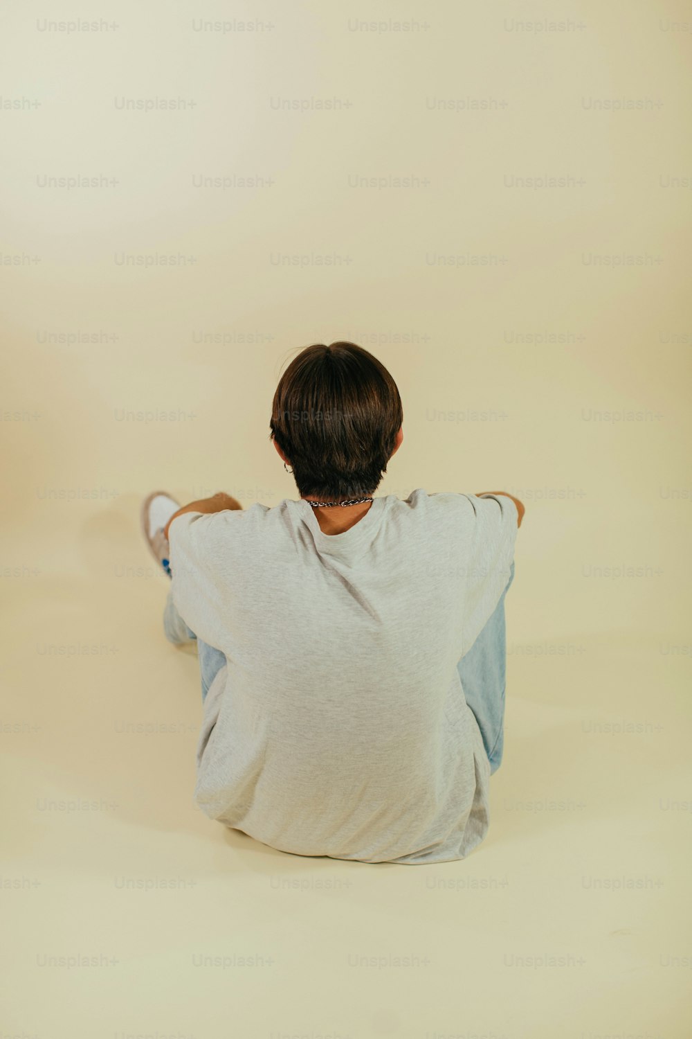 a child sitting on the floor