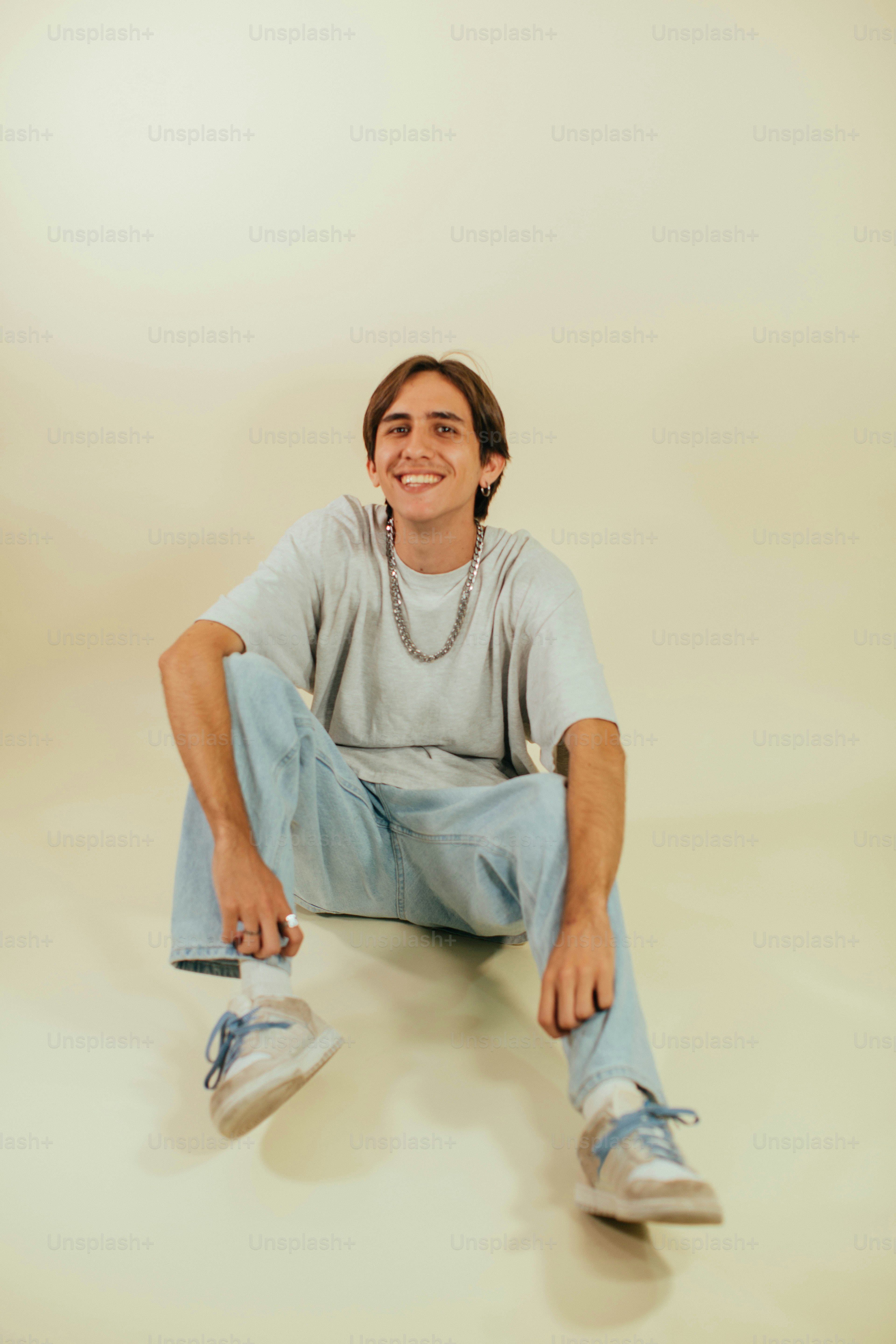 a man sitting on the floor