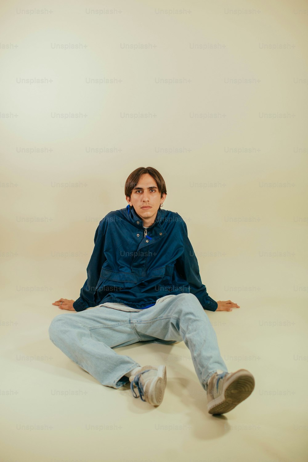 a man sitting on the floor