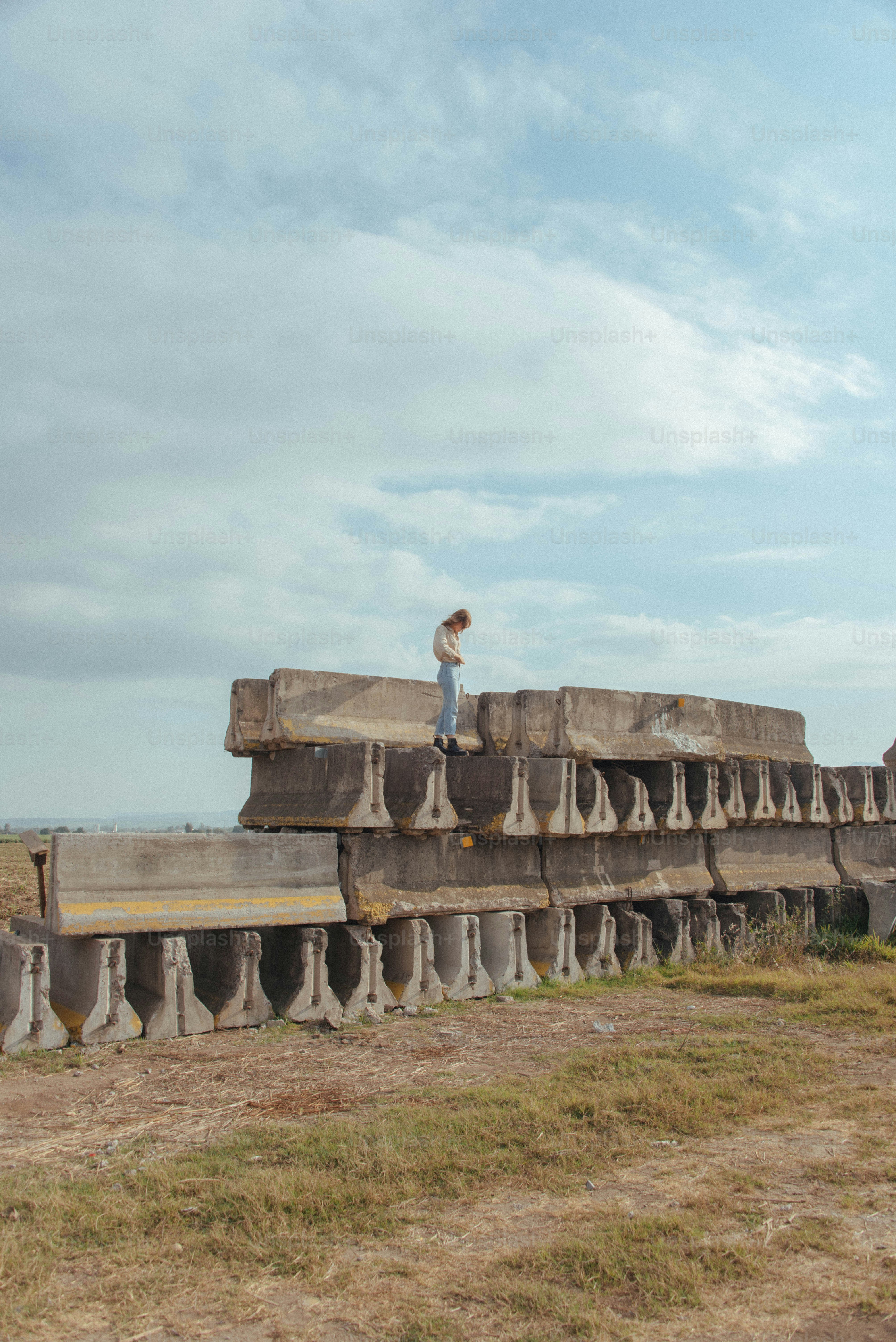 a person standing on a large metal structure