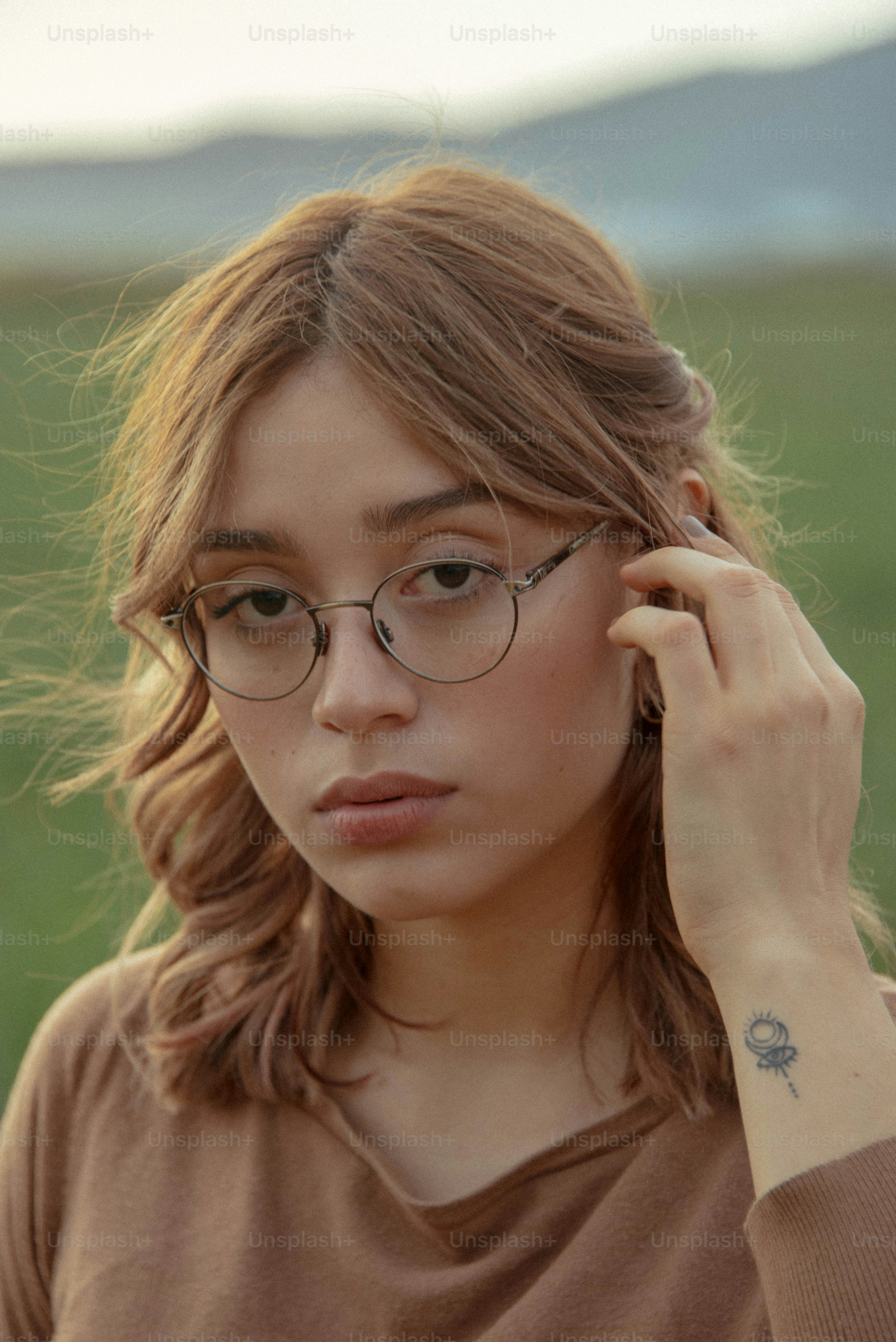 a woman with glasses