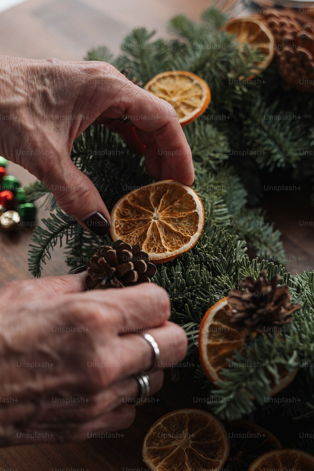 a person holding an orange