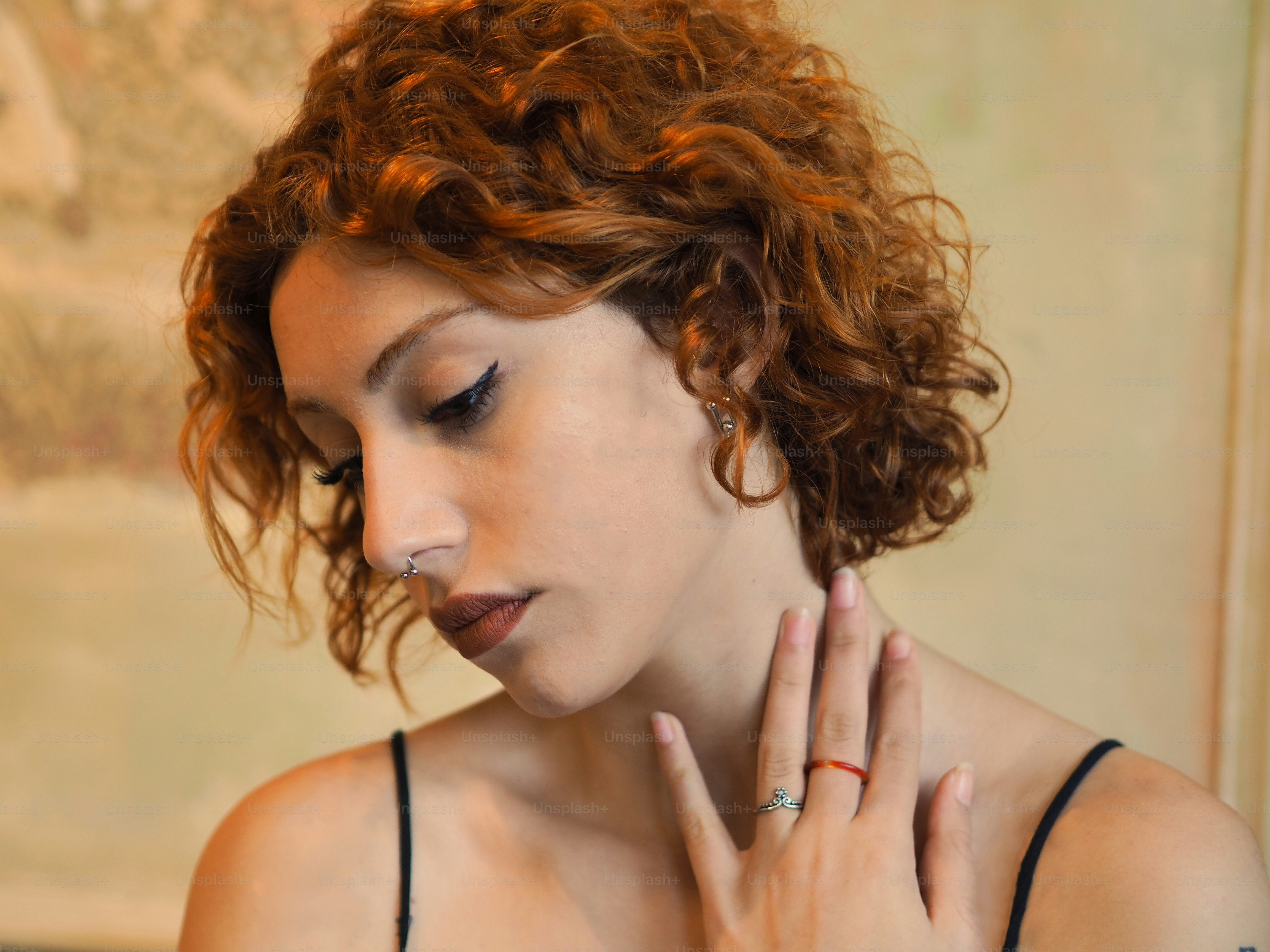 a woman with her hands on her face