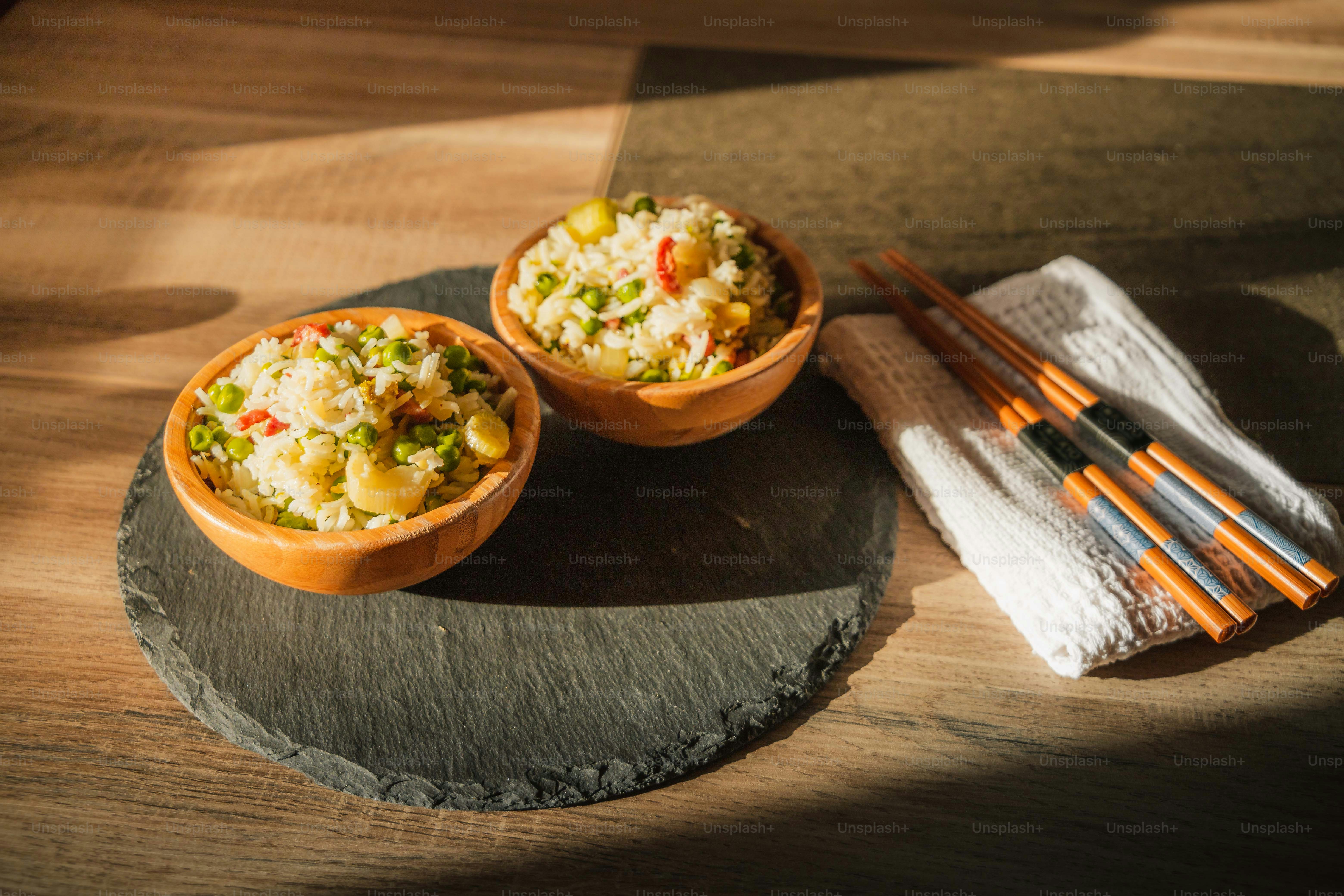 a couple of bowls with food in them