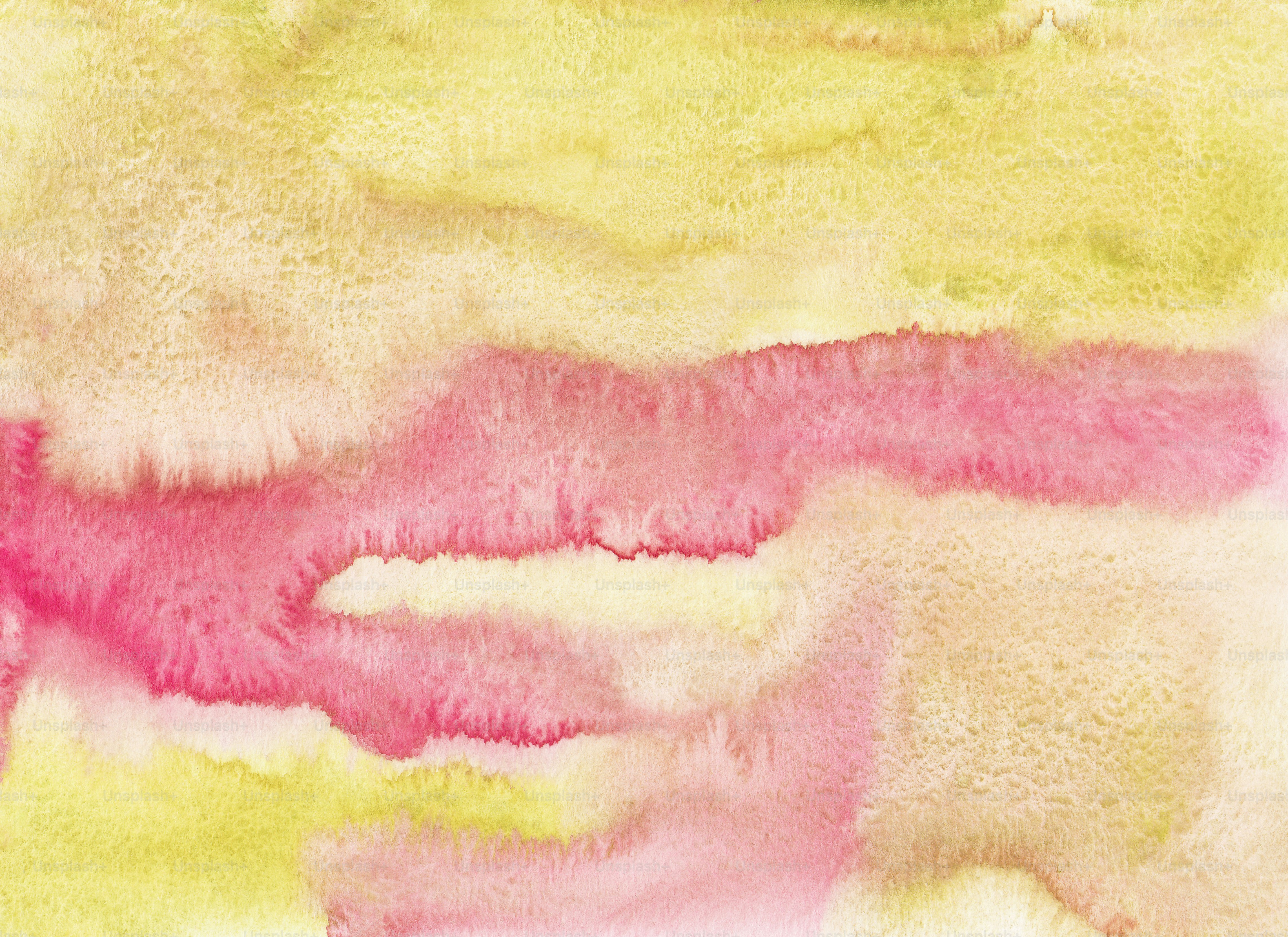 Una pintura de colores rosa y amarillo sobre un fondo blanco