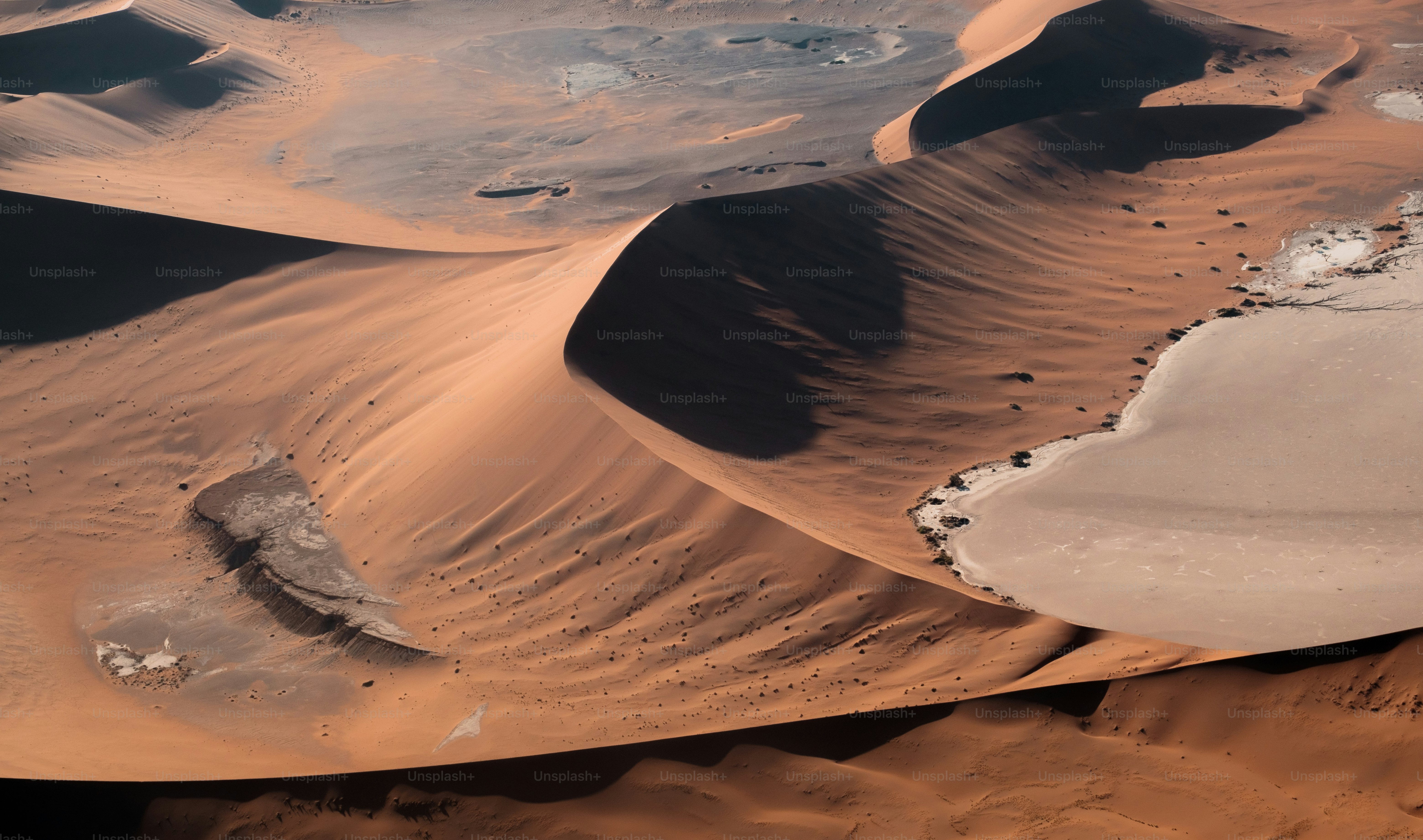 a desert landscape with sand dunes