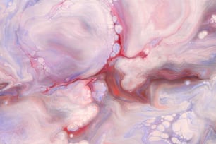 a close-up of a pink liquid
