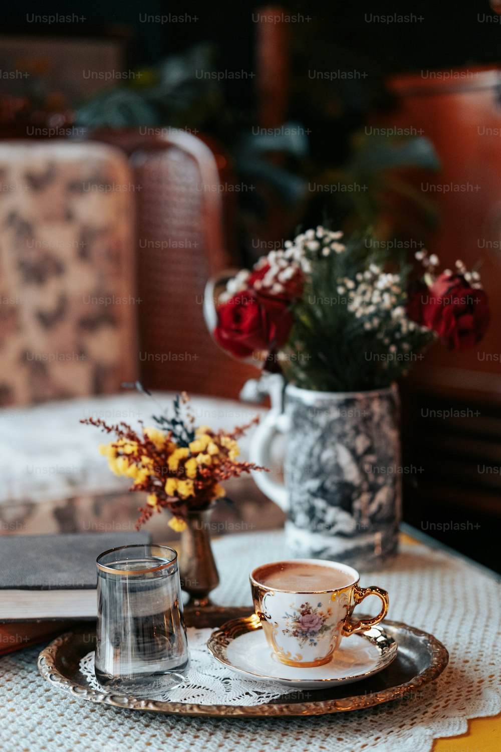 a vase of flowers sits on a table