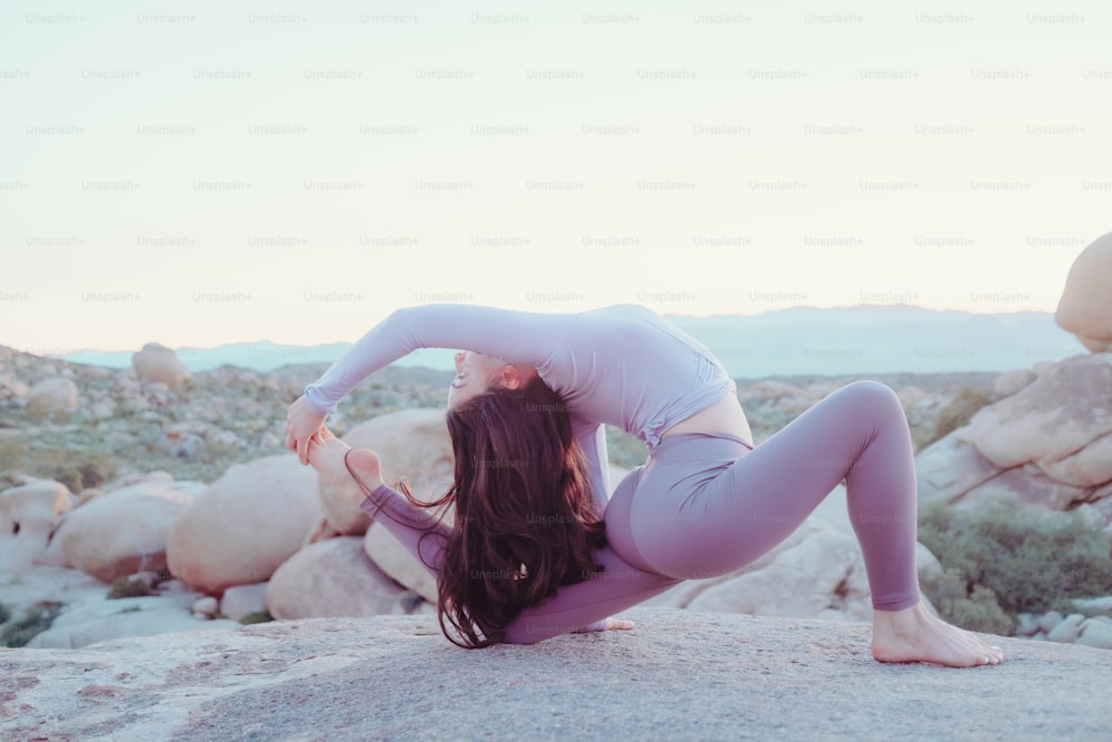 Premium Photo  Pilates or yoga a slim athletic girl is lying on