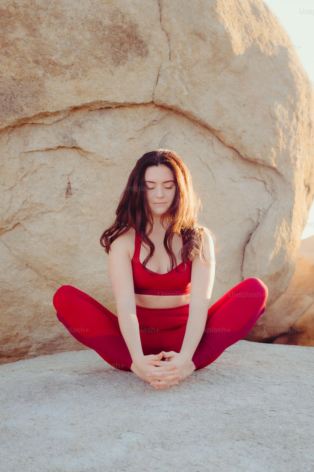 Girl sitting beautiful woman in yoga pants hi-res stock