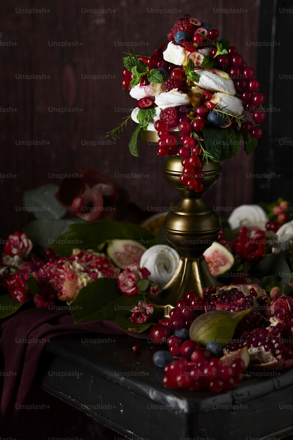 a decorated vase with berries