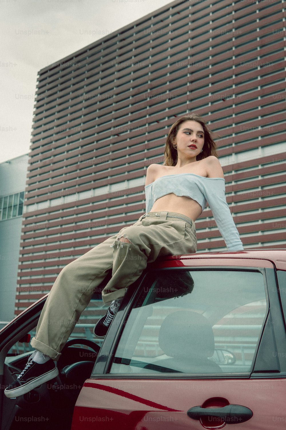 a person sitting on a car