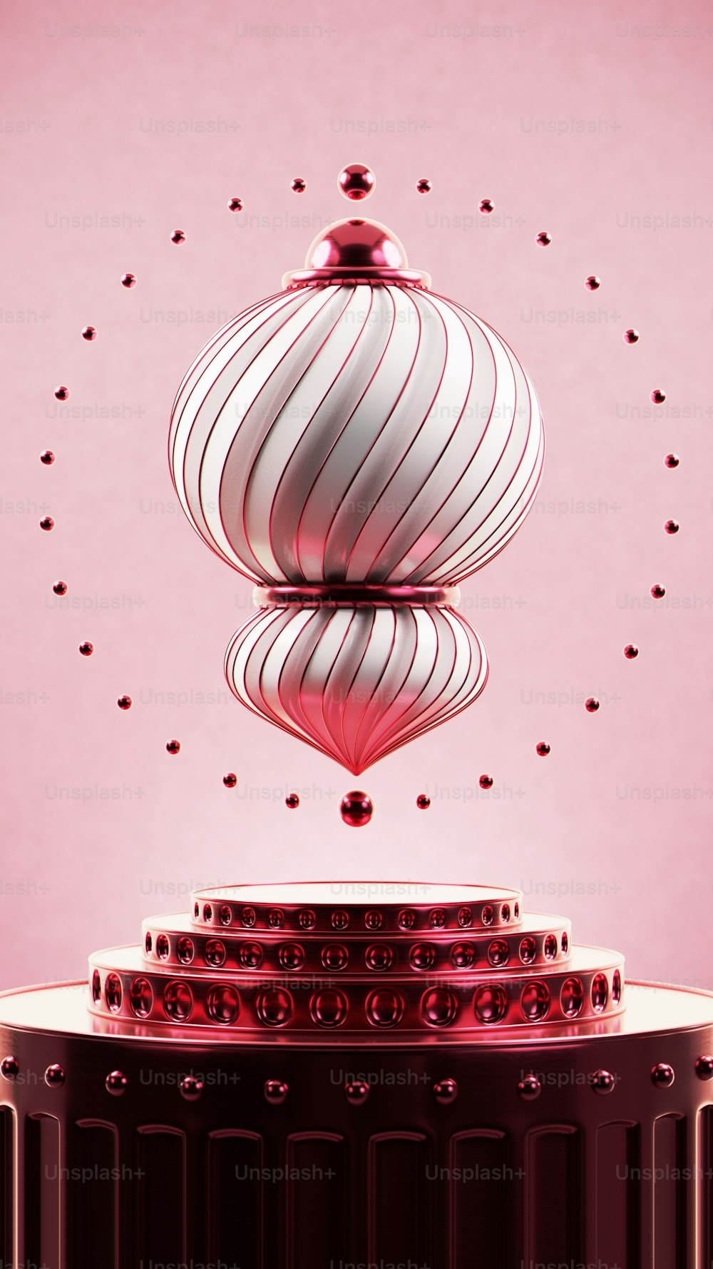 a red and white circular object with a pink background