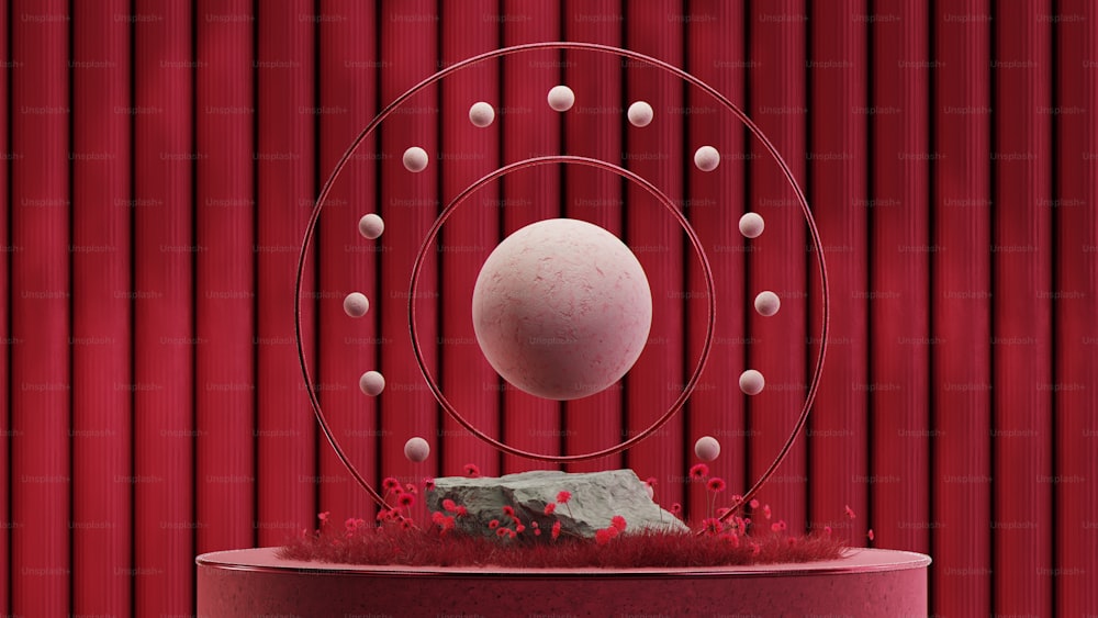 a white ball on a red surface
