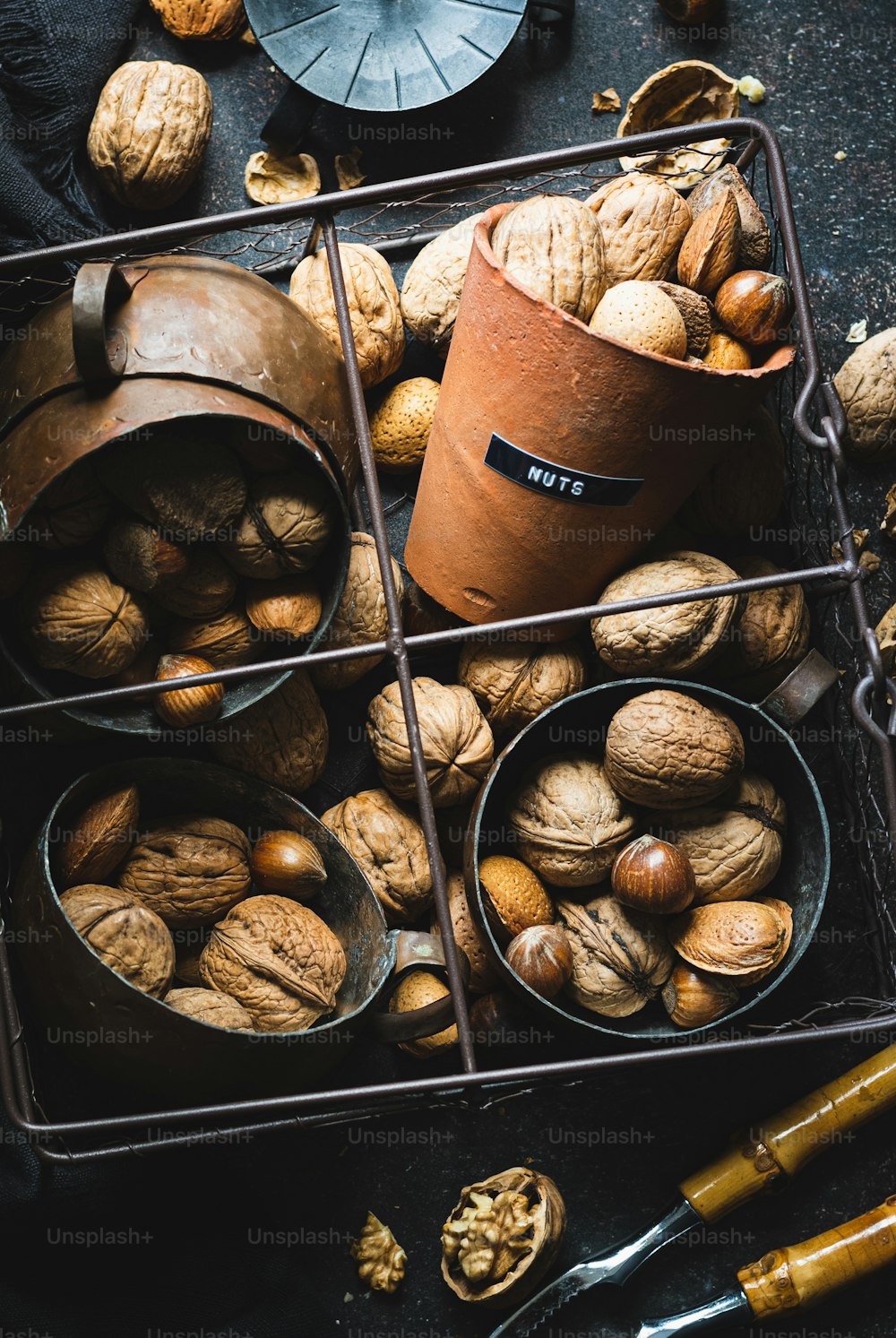 a group of brown and white objects in metal containers