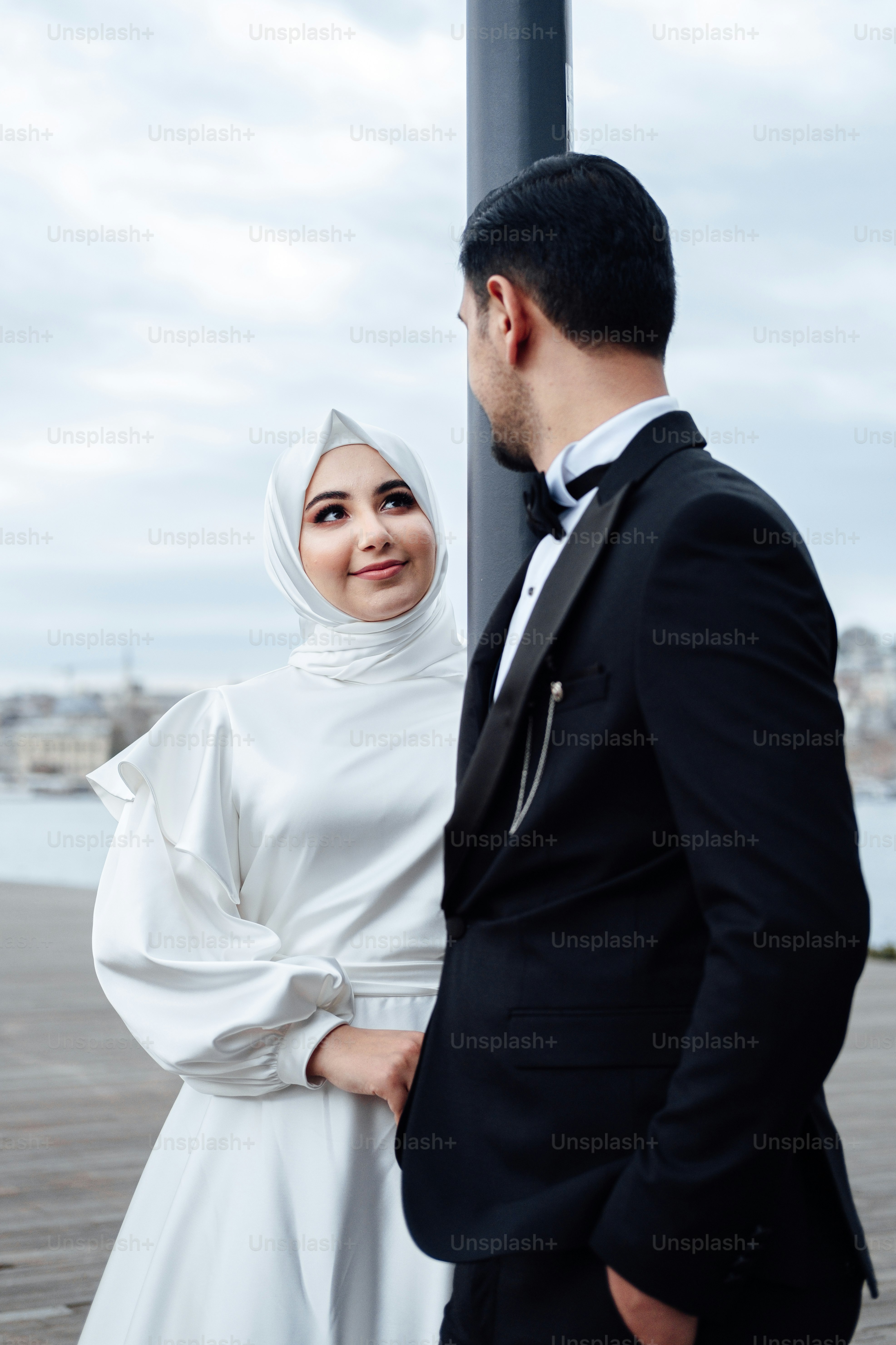 a man and woman posing for a picture