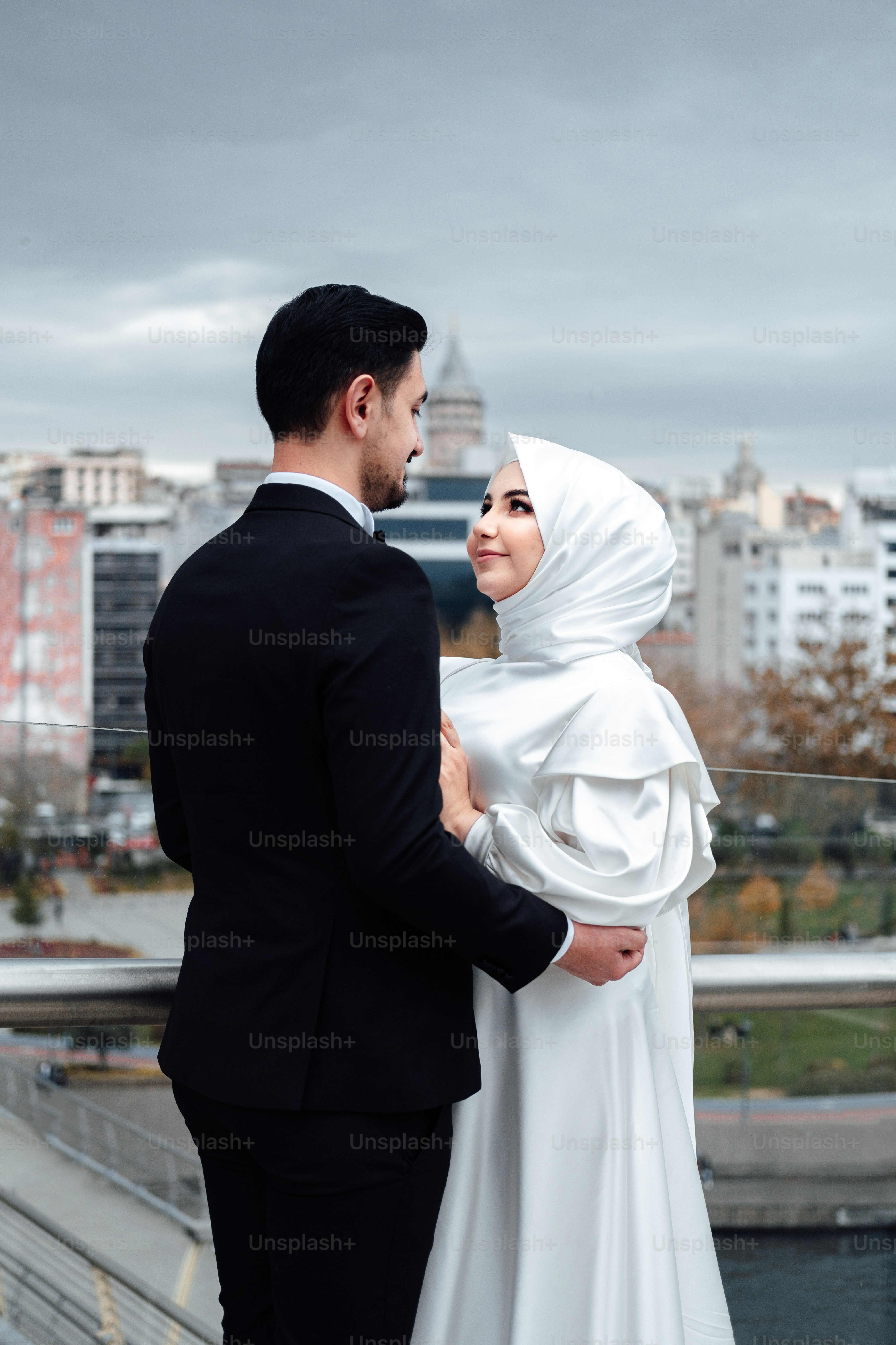 A man and woman in wedding attire photo – Brides Image on Unsplash