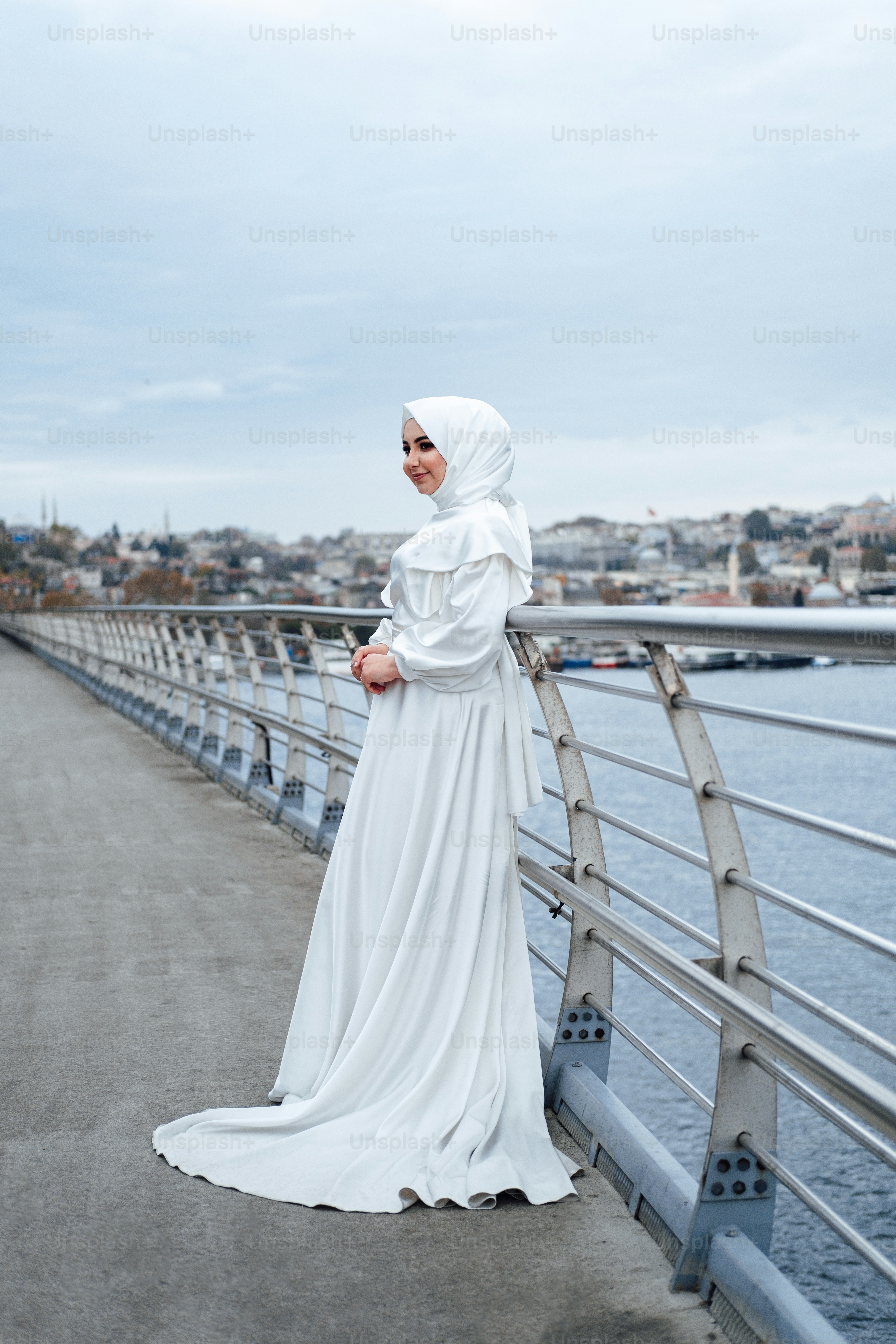 a man in a white dress