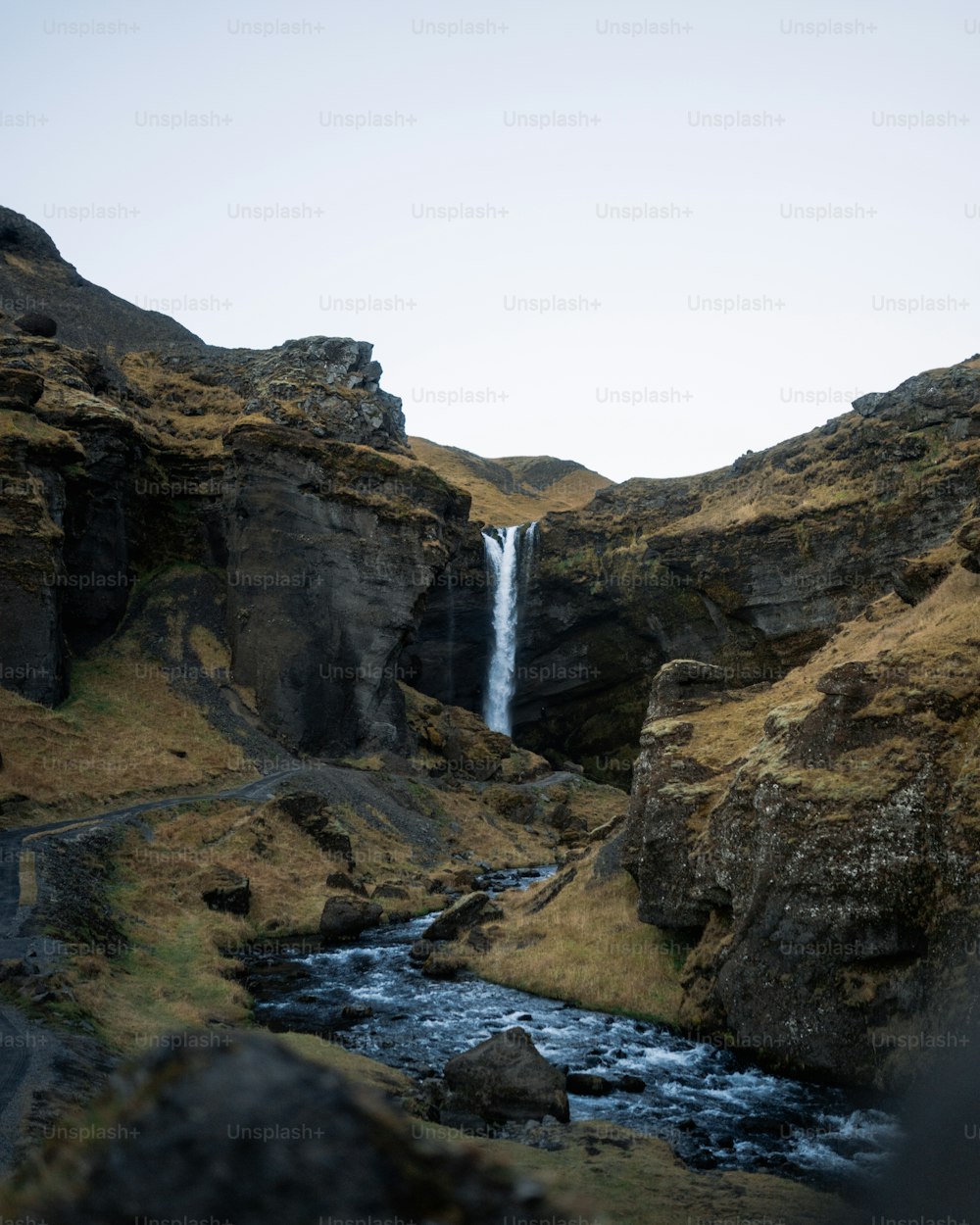 a waterfall in a rocky area