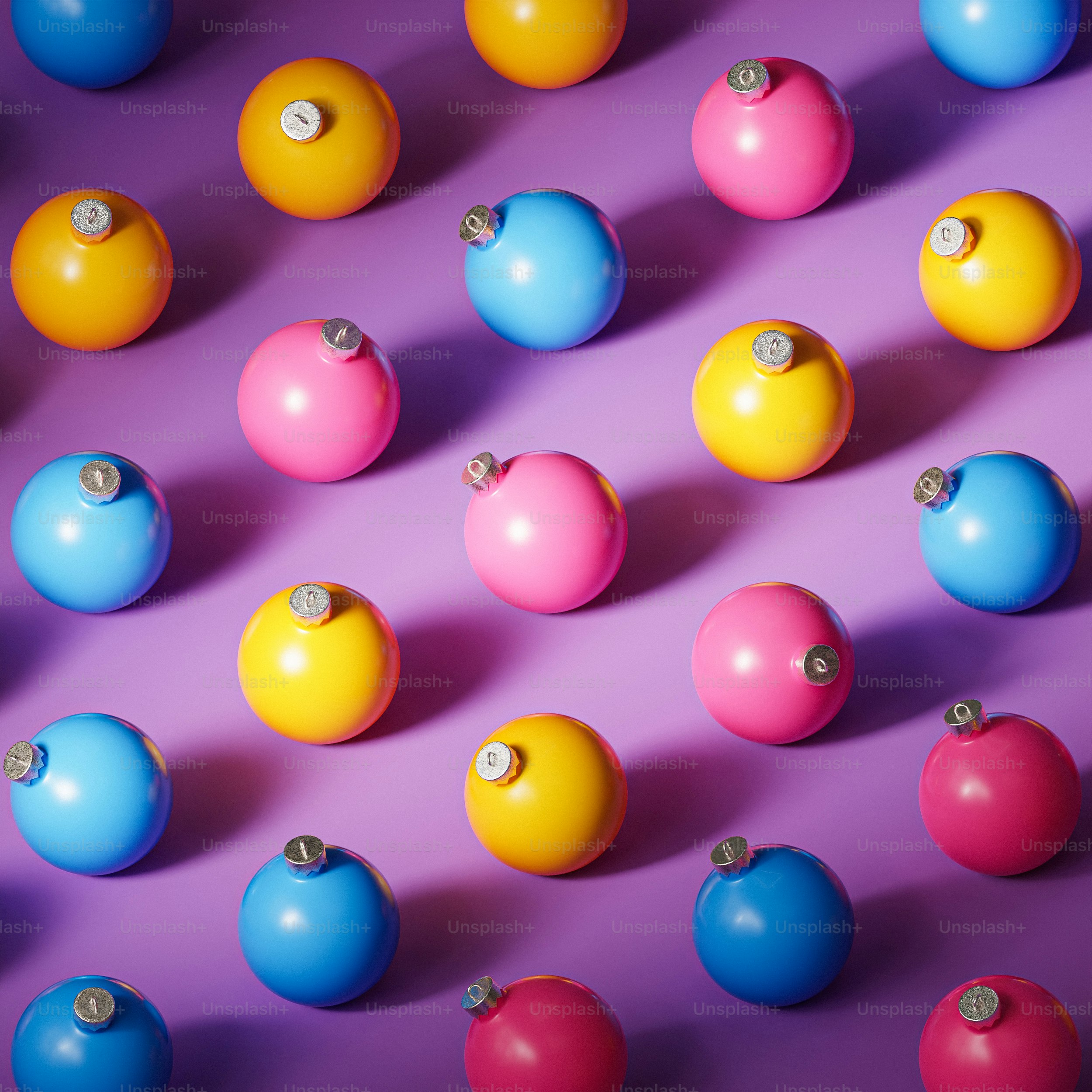 Foto Un grupo de bolas de colores – Decoración Imagen en Unsplash