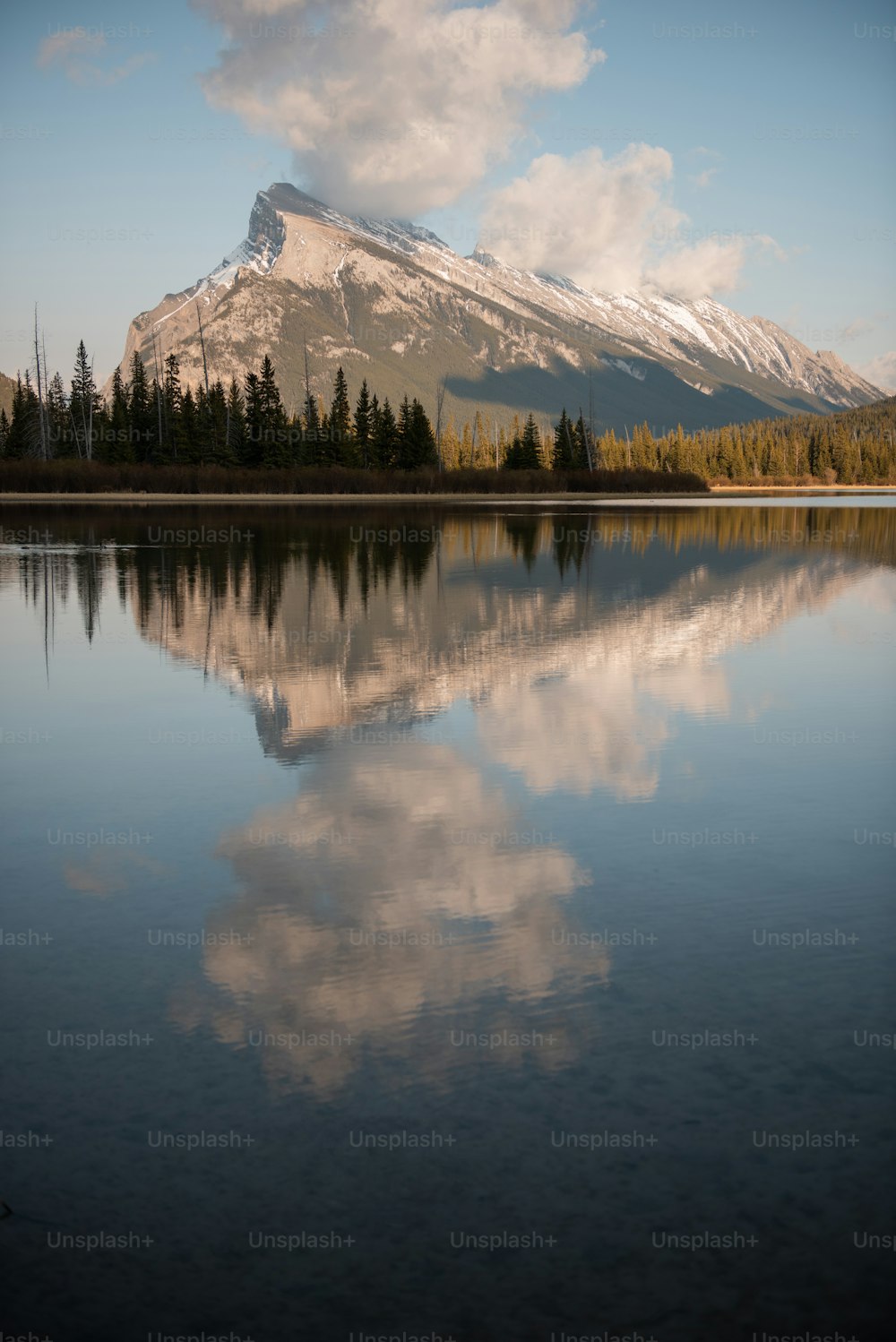 a mountain reflected in a lake