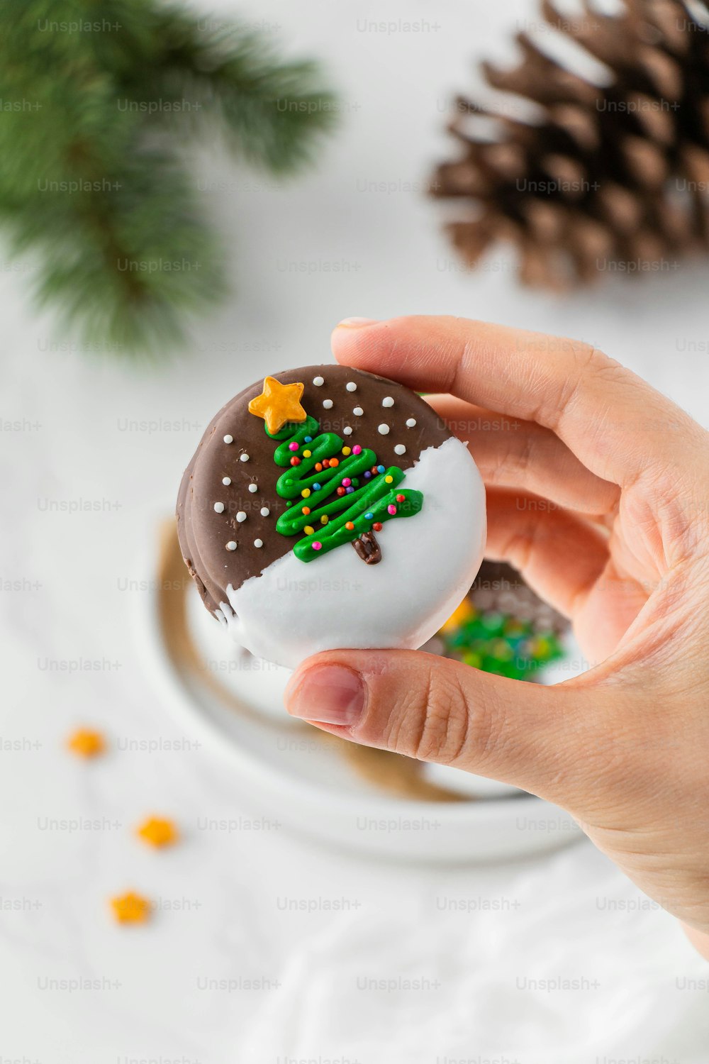 a person holding a donut