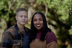 a man and woman smiling