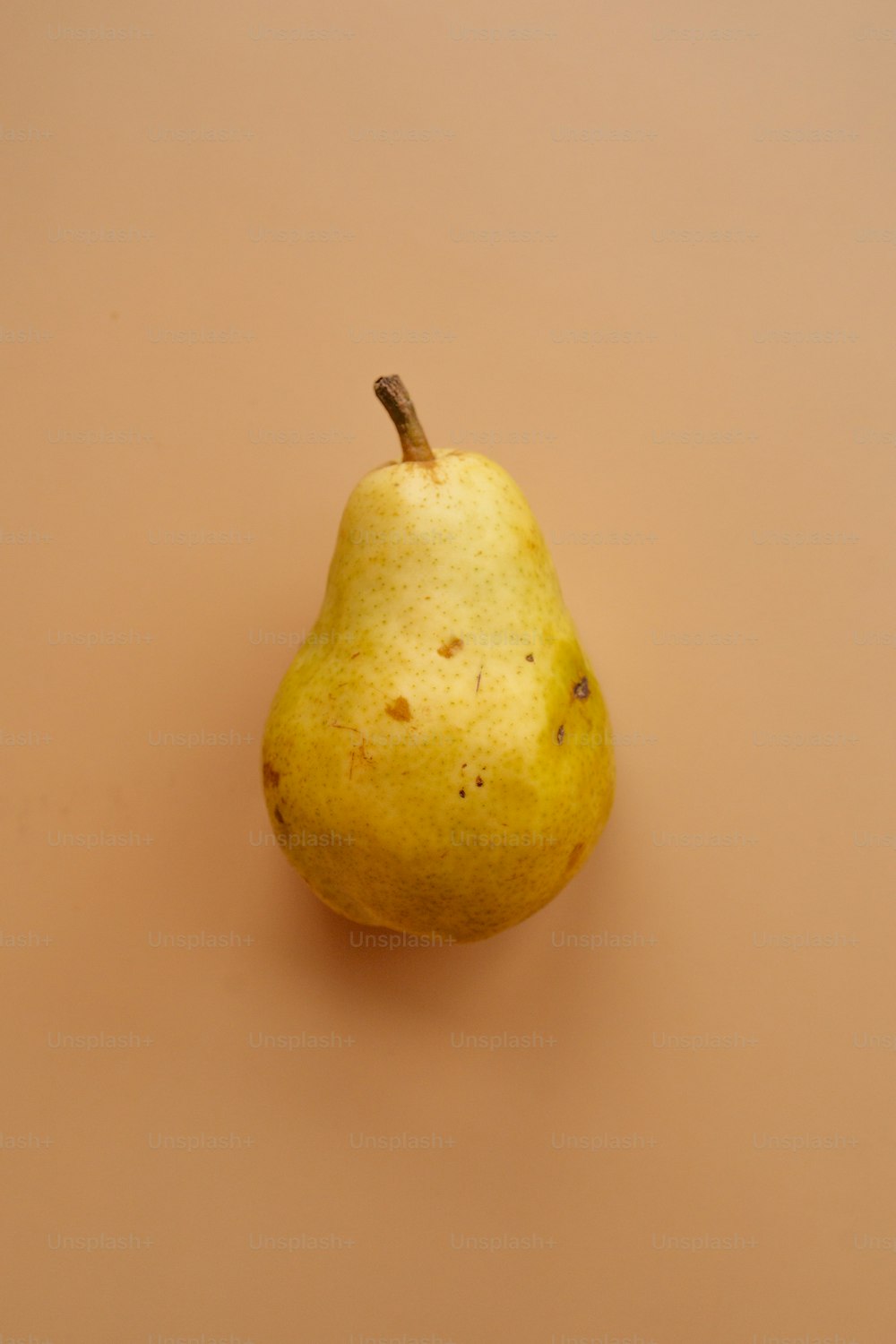 a pear on a table
