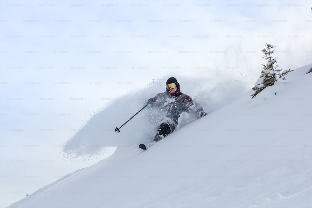 a person skiing down a mountain