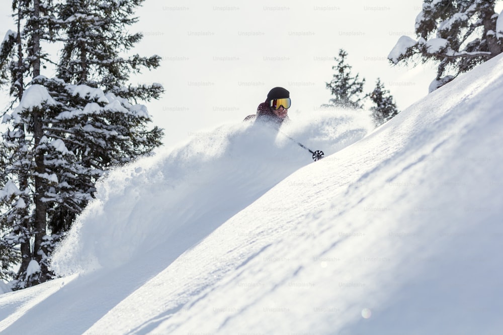 a person skiing down a mountain