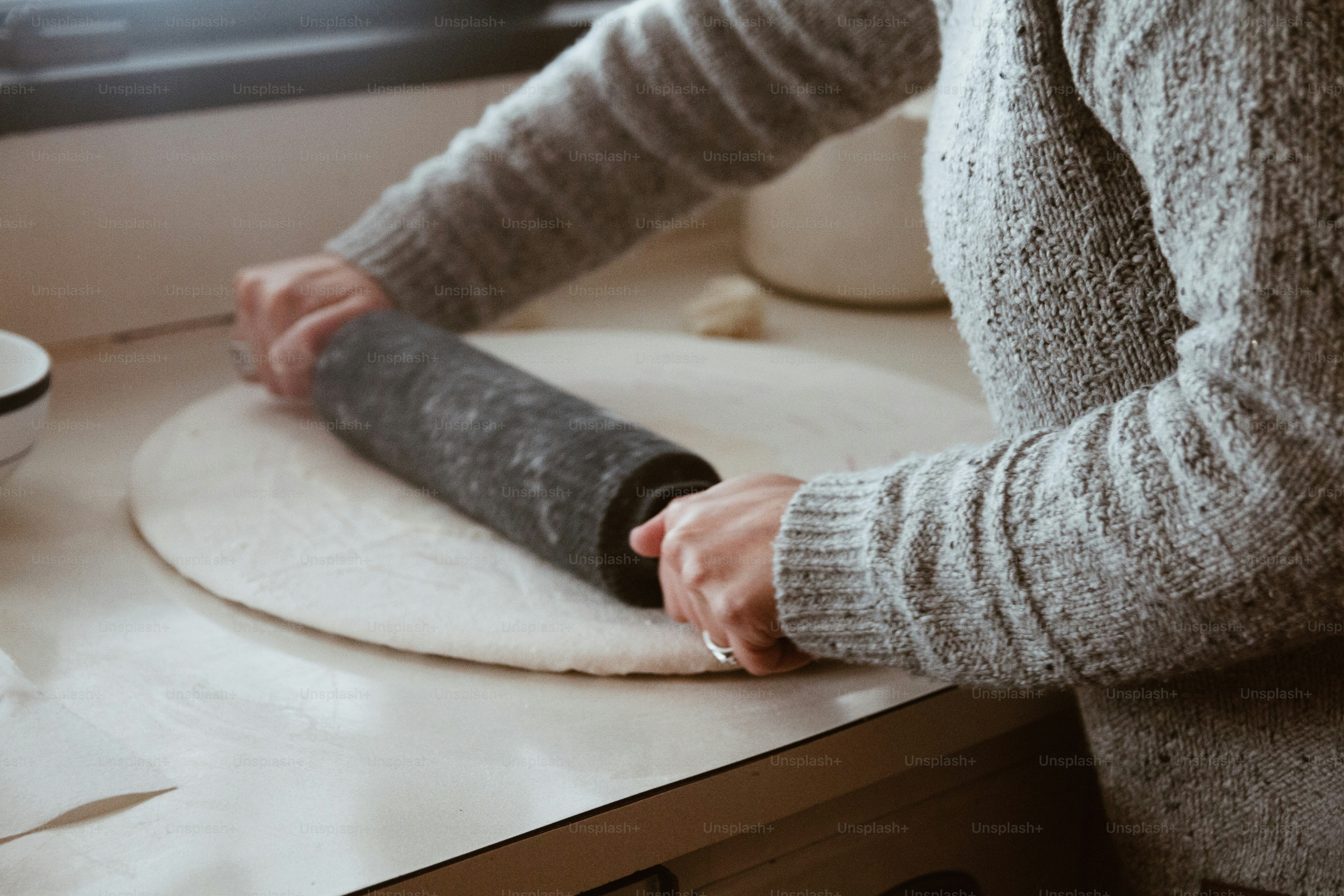 a person making a dough