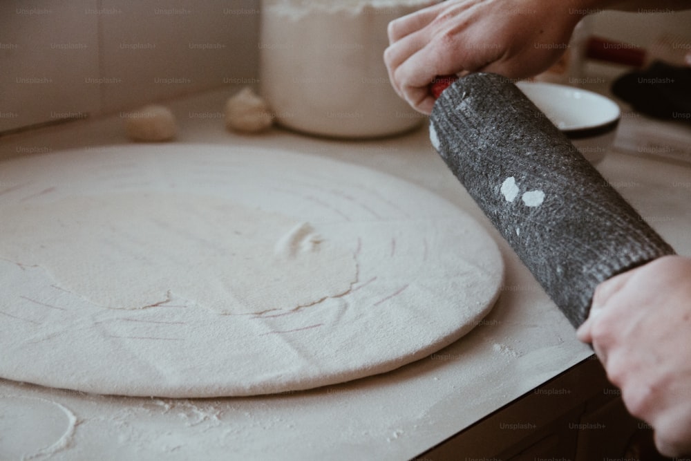 a person making a dough