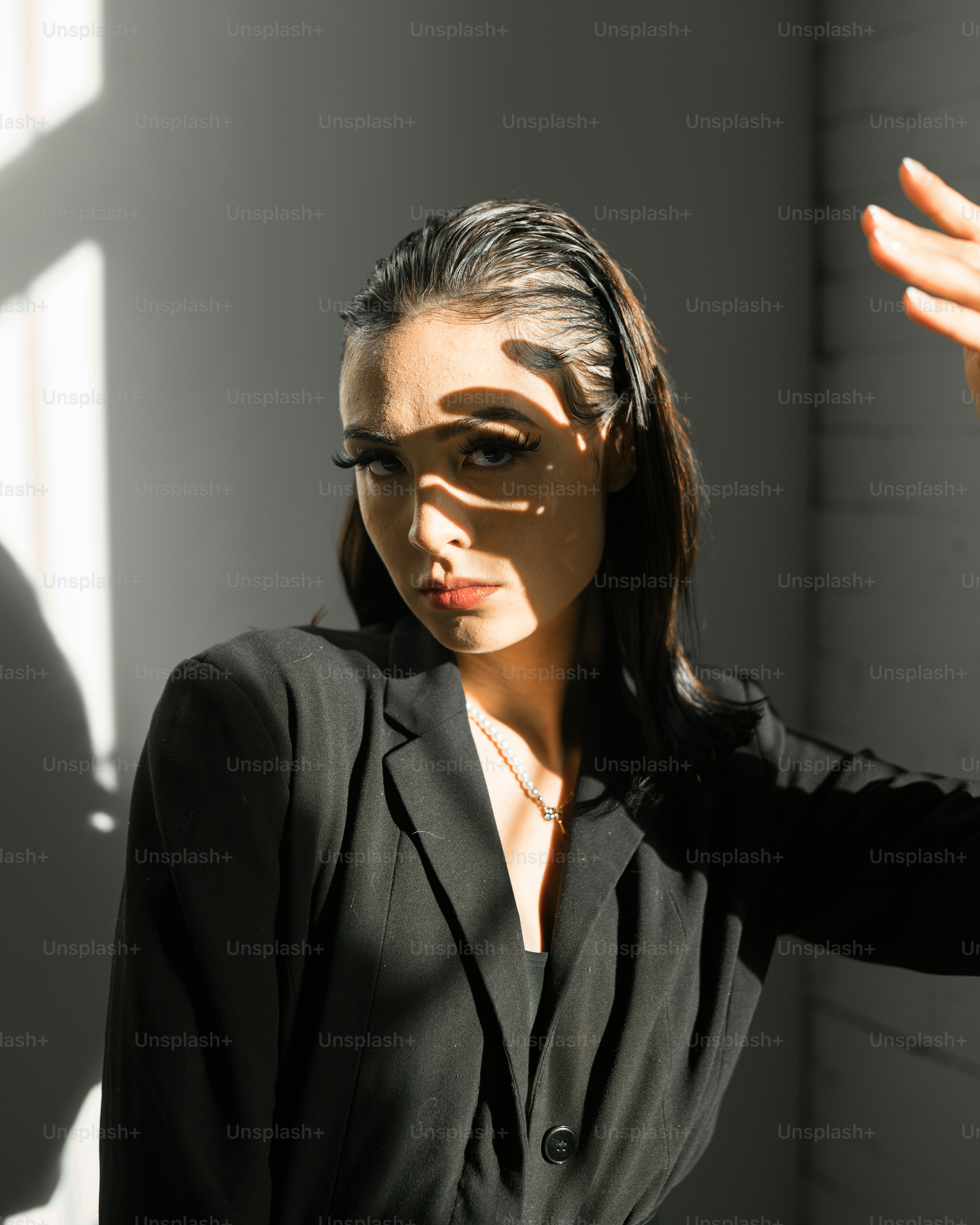 a person with the hand up