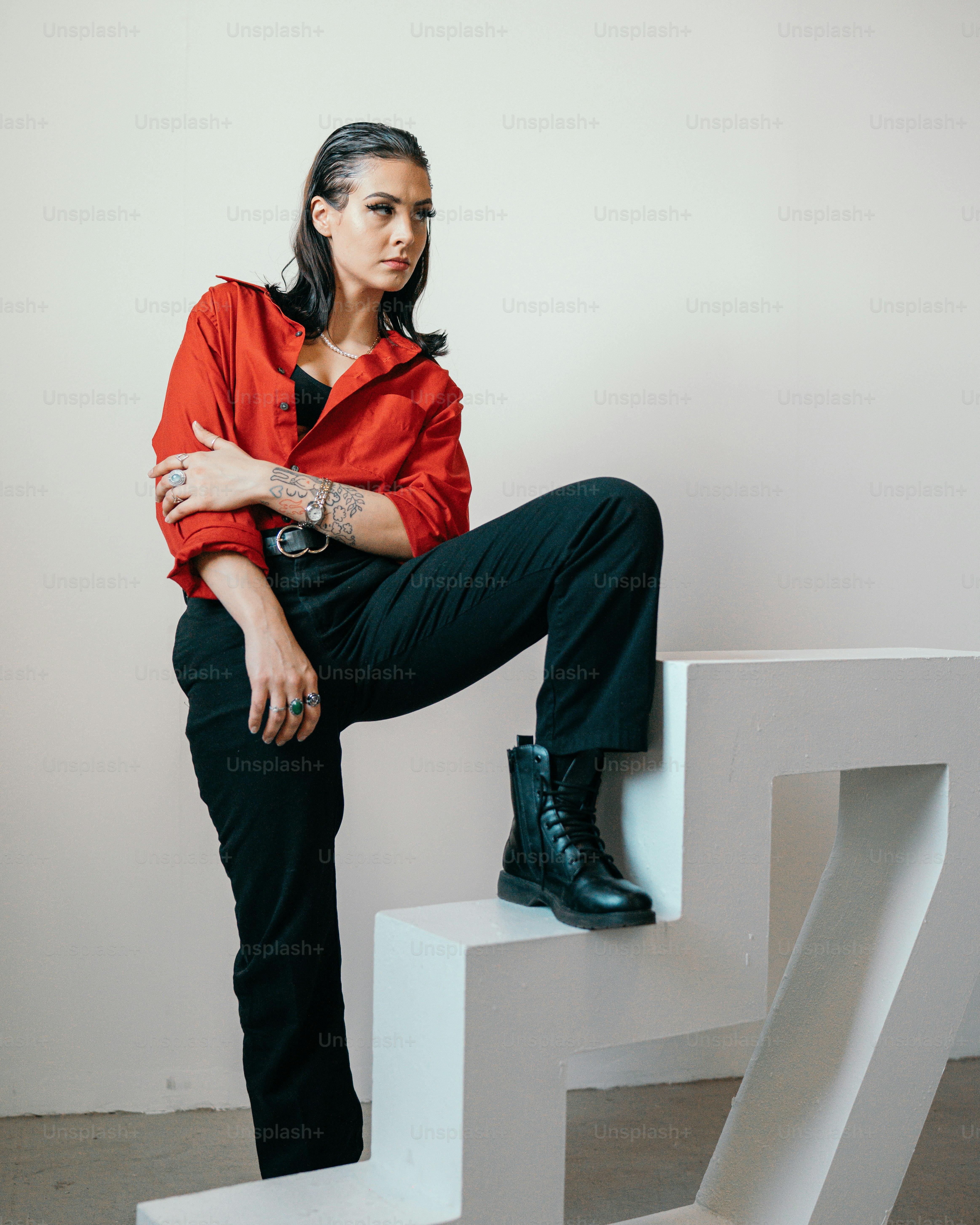 a man sitting on a white bench