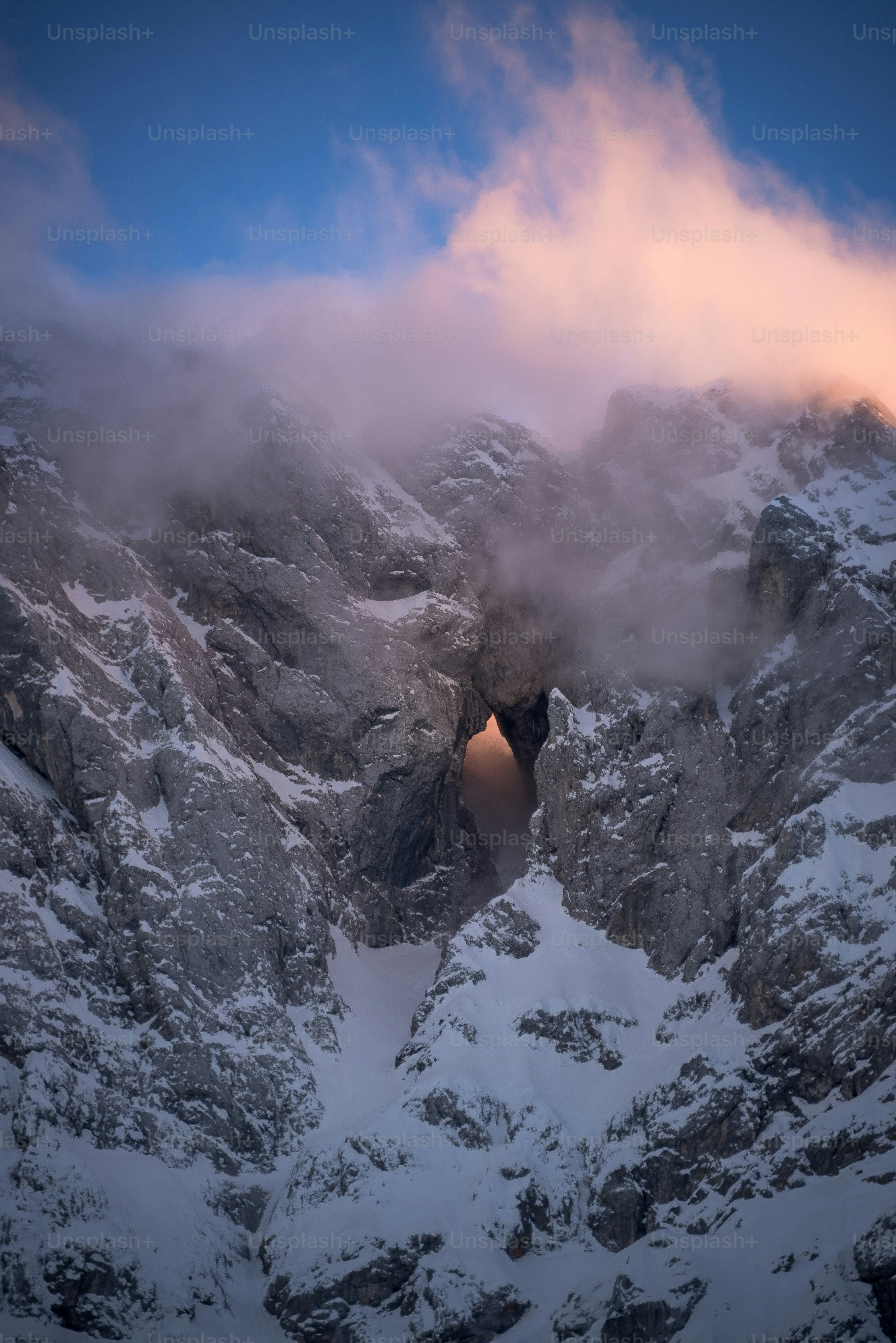 A natural window of mountain Prisank in the Julian Alps in Europe.