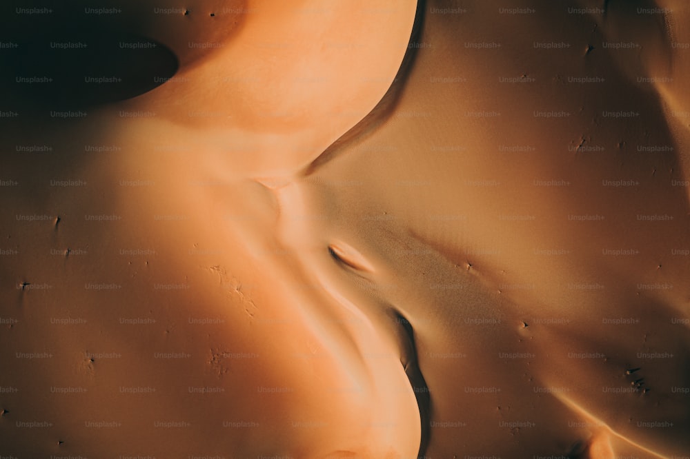 a close up of a desert with sand dunes