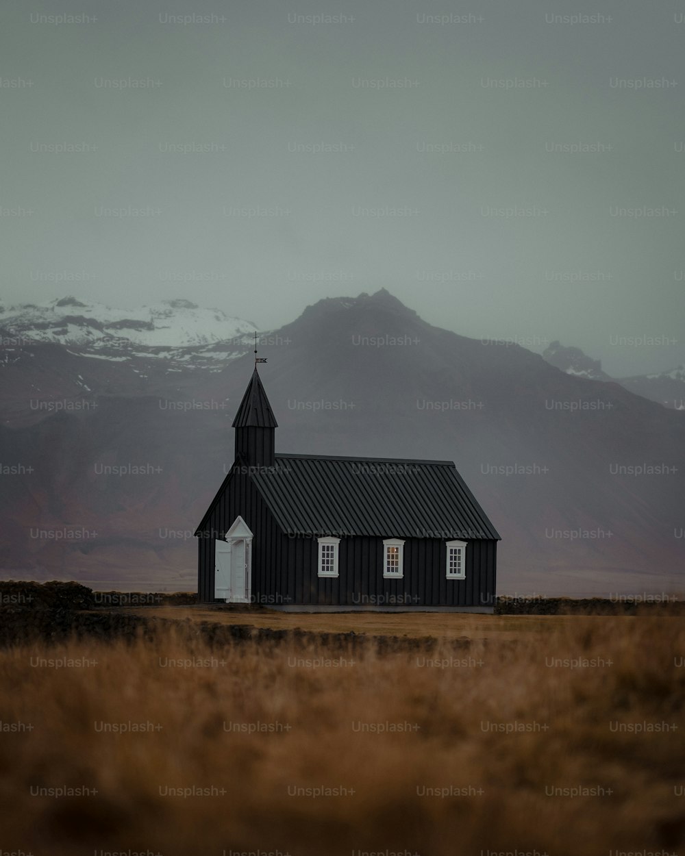 a small building in a field