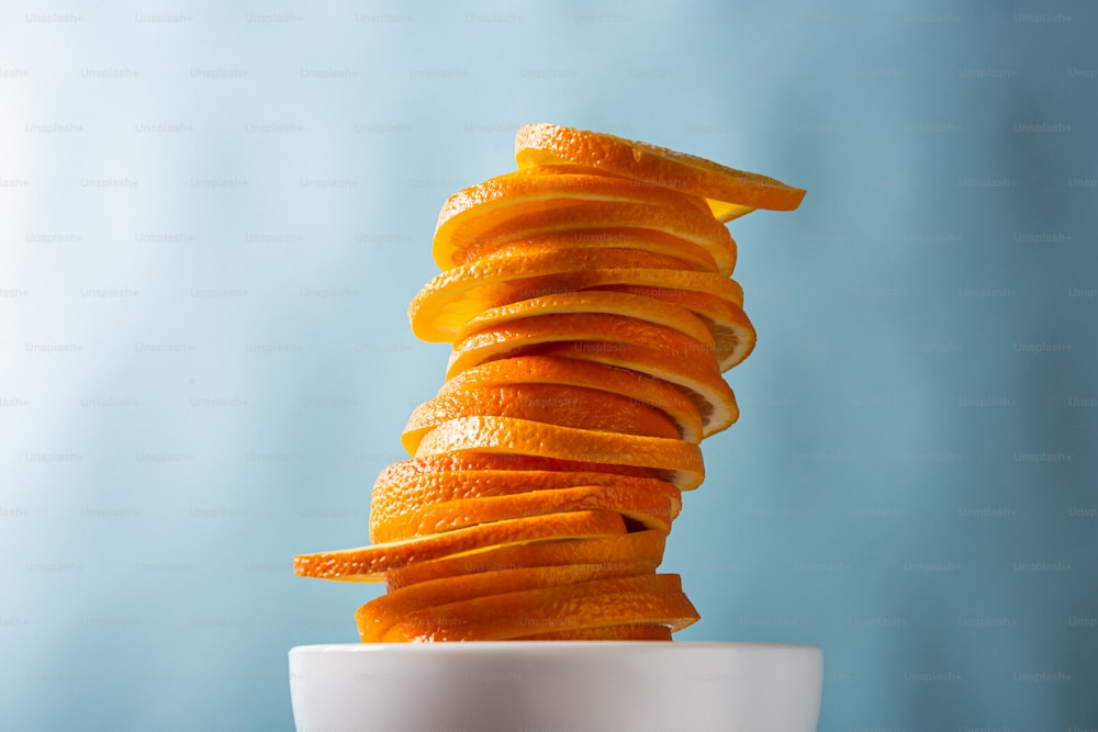 a stack of orange macaroons