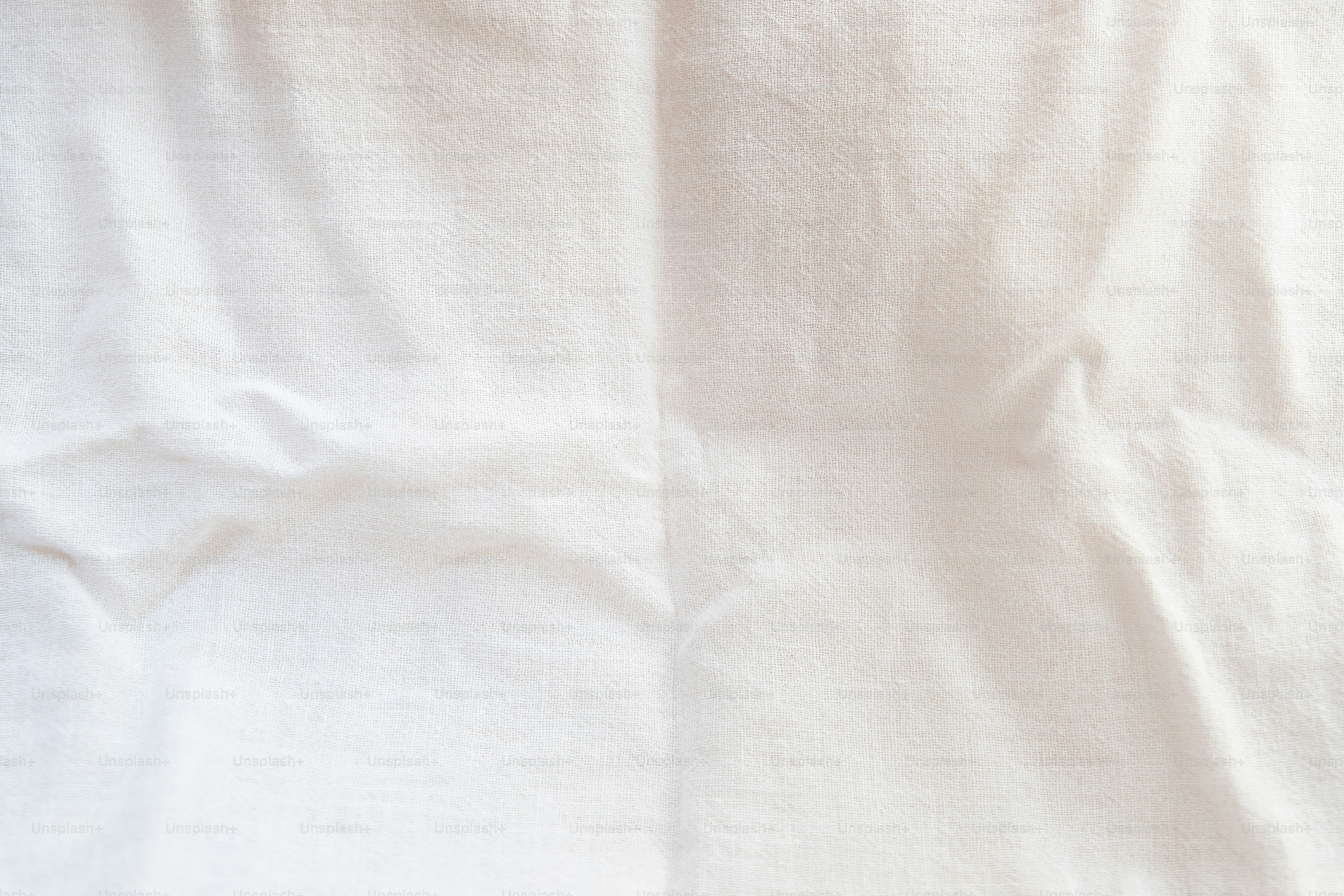 un primo piano di un tessuto bianco