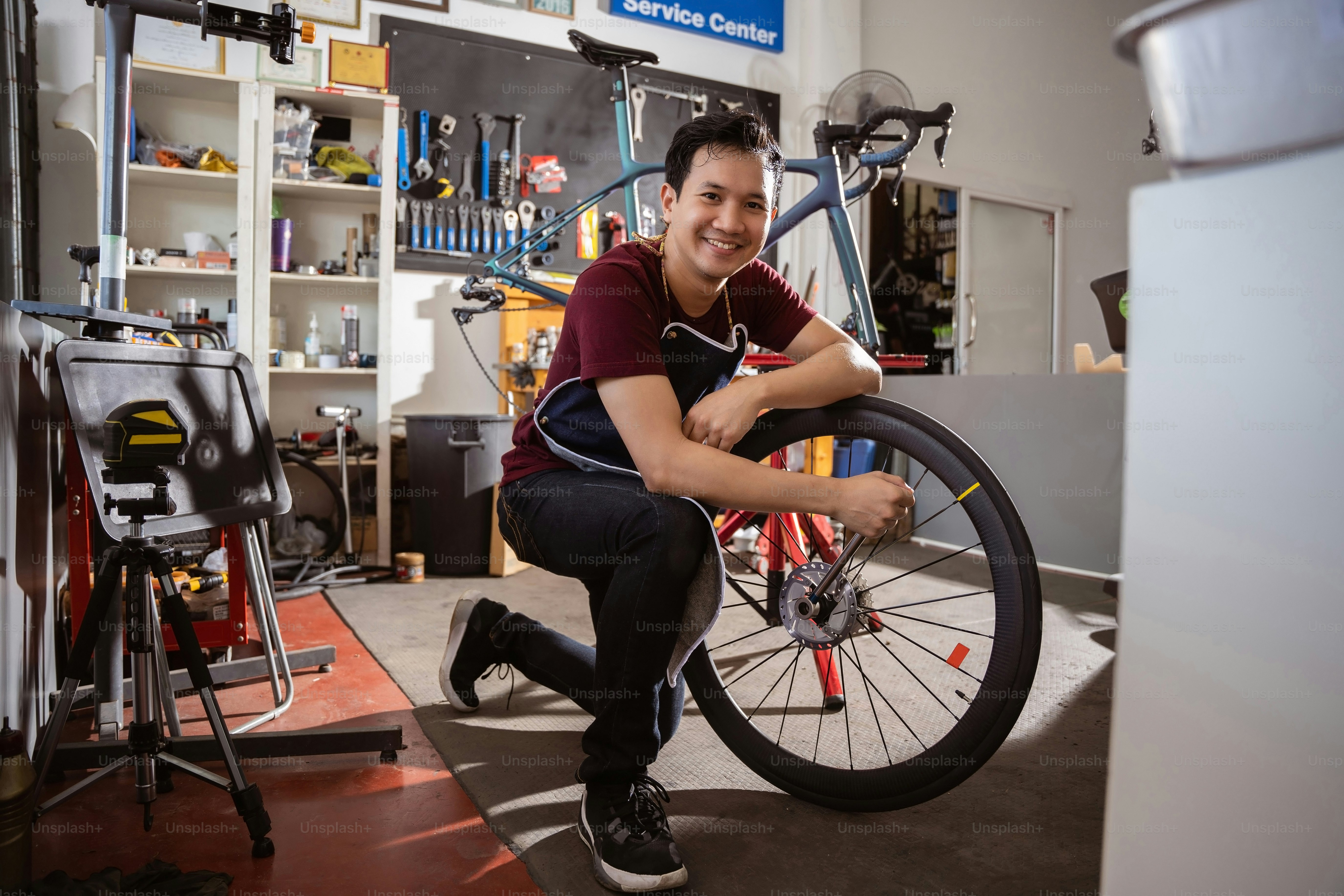 Repair technician bicycles was repaired gear bike shop. photo Restore