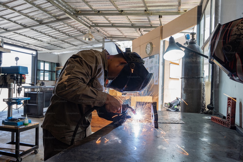 Professional technicians are welding metal materials.
